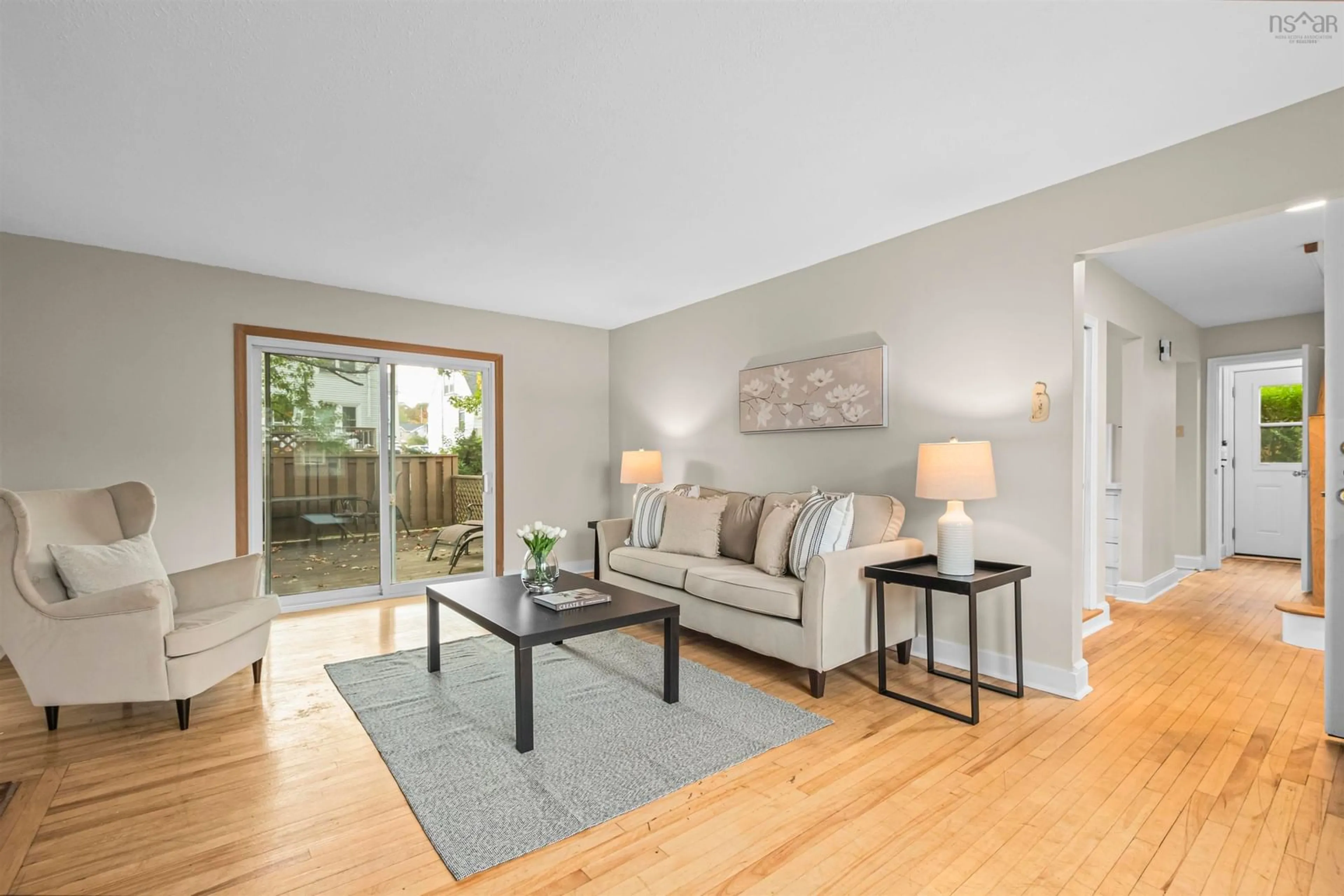 Living room with furniture, wood/laminate floor for 3176 Hemlock St, Halifax Nova Scotia B3L 4B6