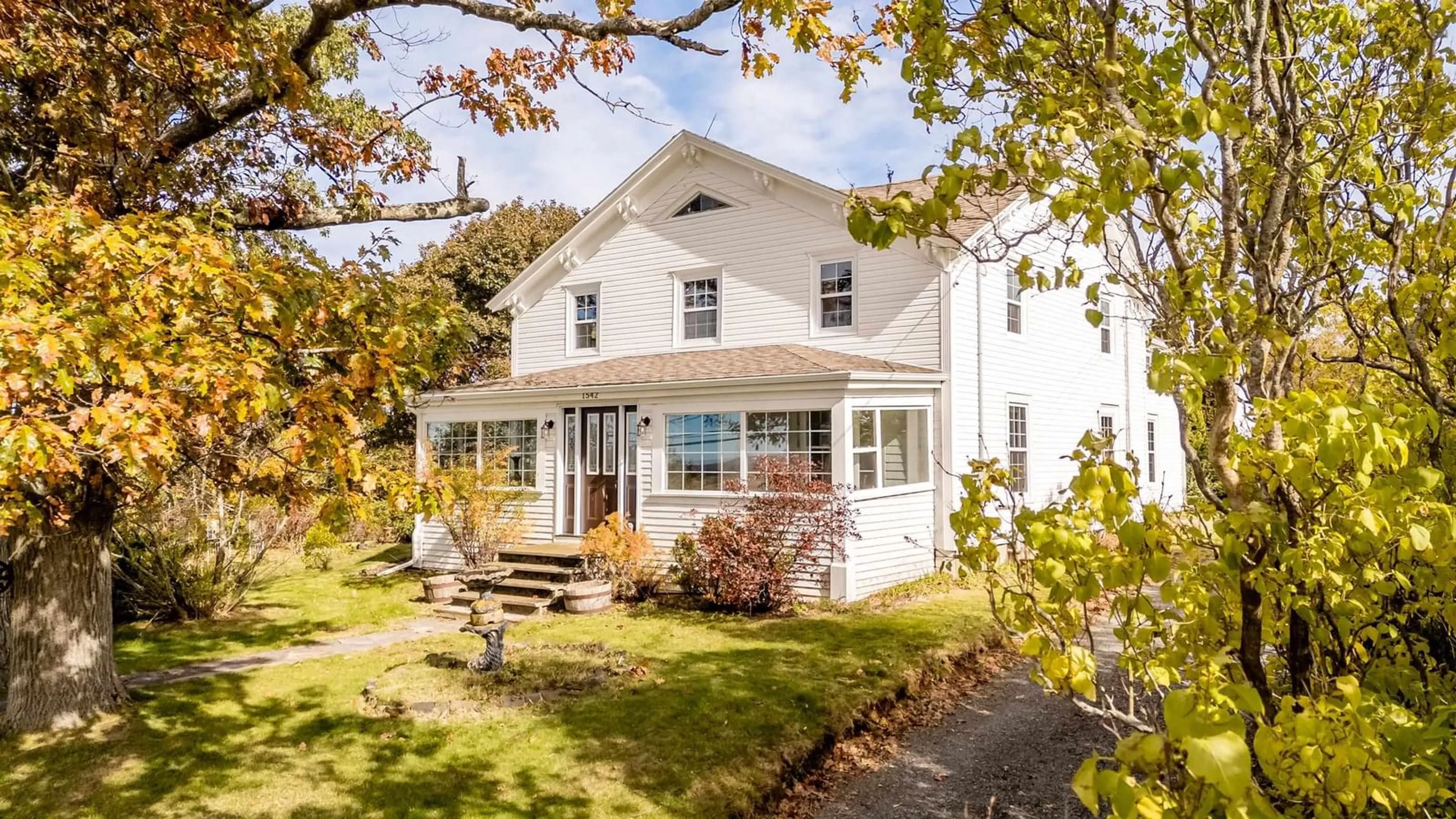 Home with vinyl exterior material, street for 1542 Highway 358, Port Williams Nova Scotia B0P 1T0