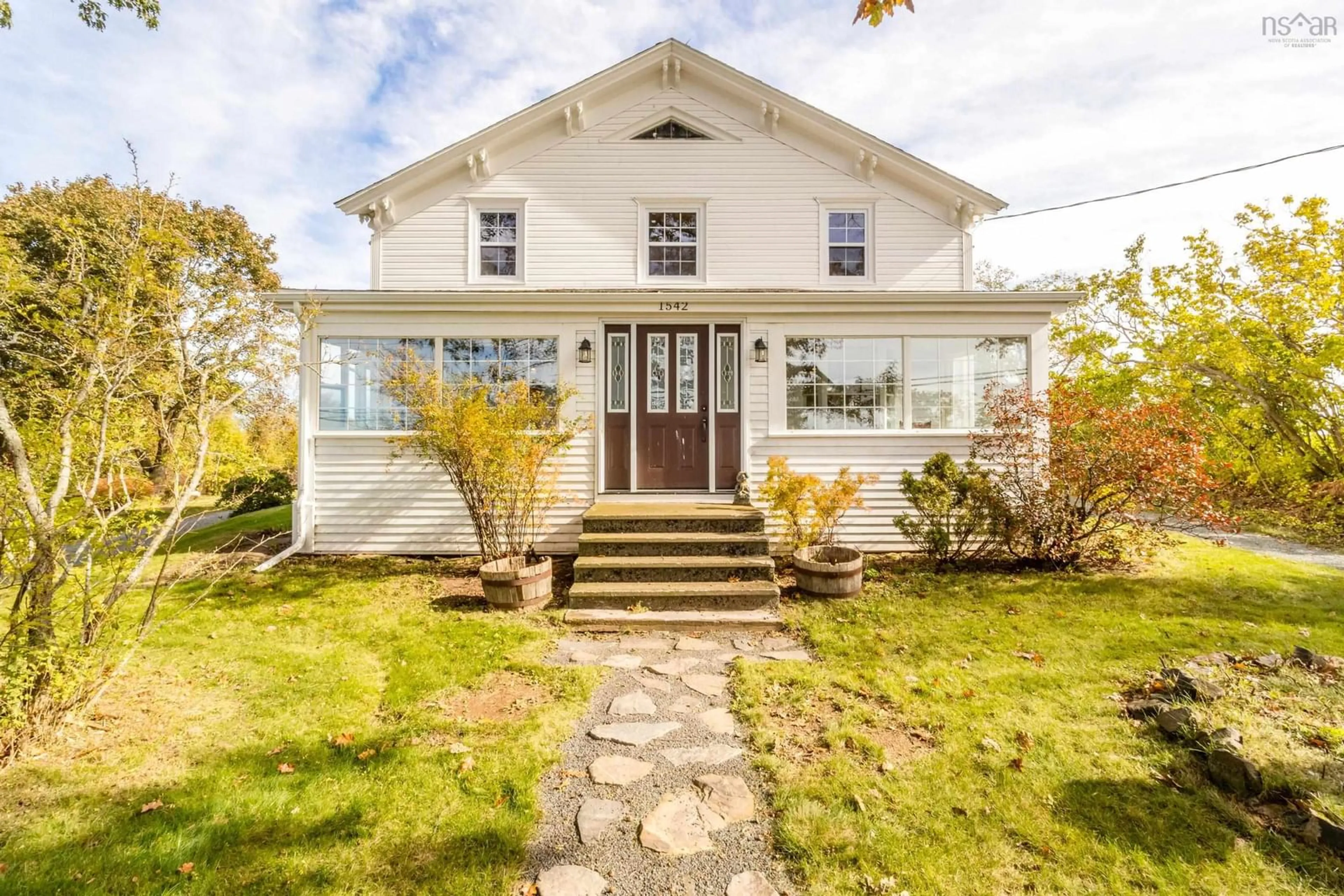 Home with vinyl exterior material, street for 1542 Highway 358, Port Williams Nova Scotia B0P 1T0