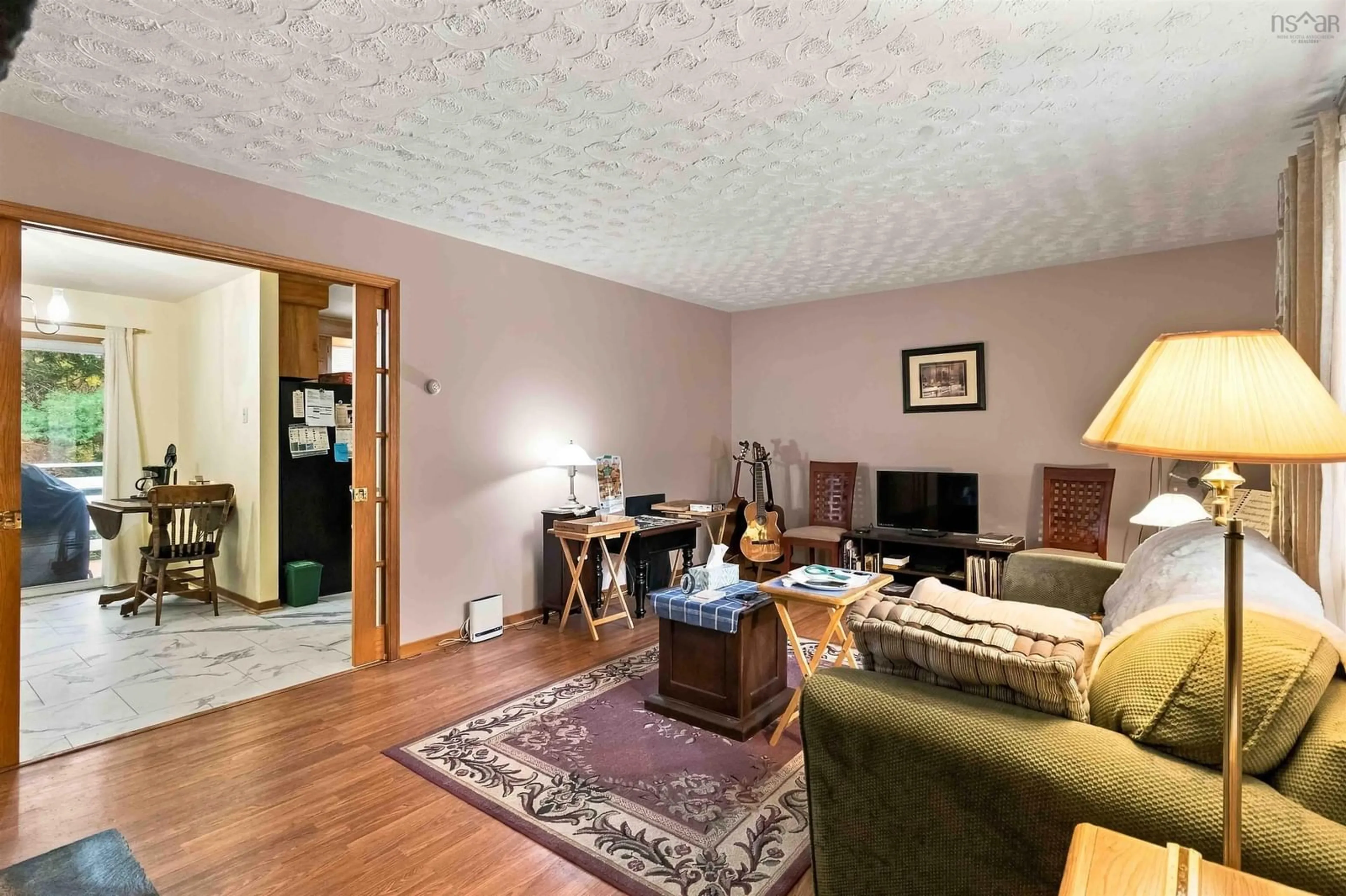 Living room with furniture, wood/laminate floor for 36 Janet Dr, Beaver Bank Nova Scotia B4G 1C4