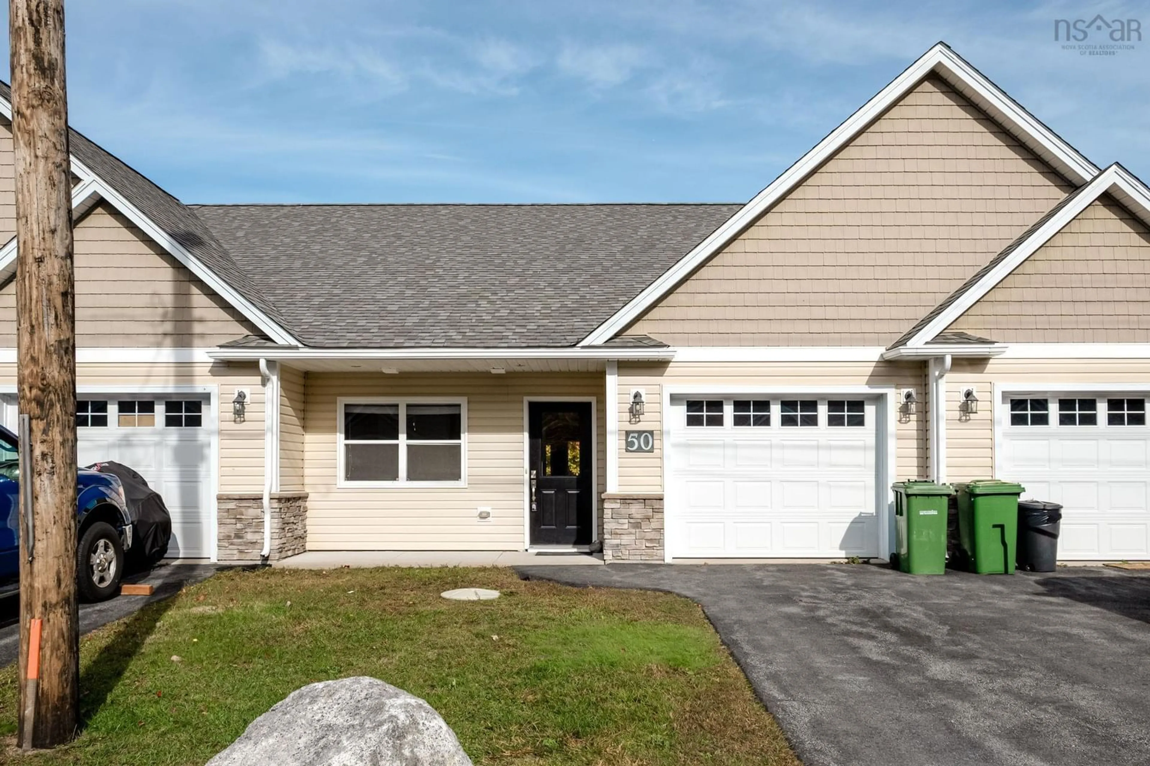 Home with vinyl exterior material, street for 50 Founders Crt, Porters Lake Nova Scotia B3E 0C3