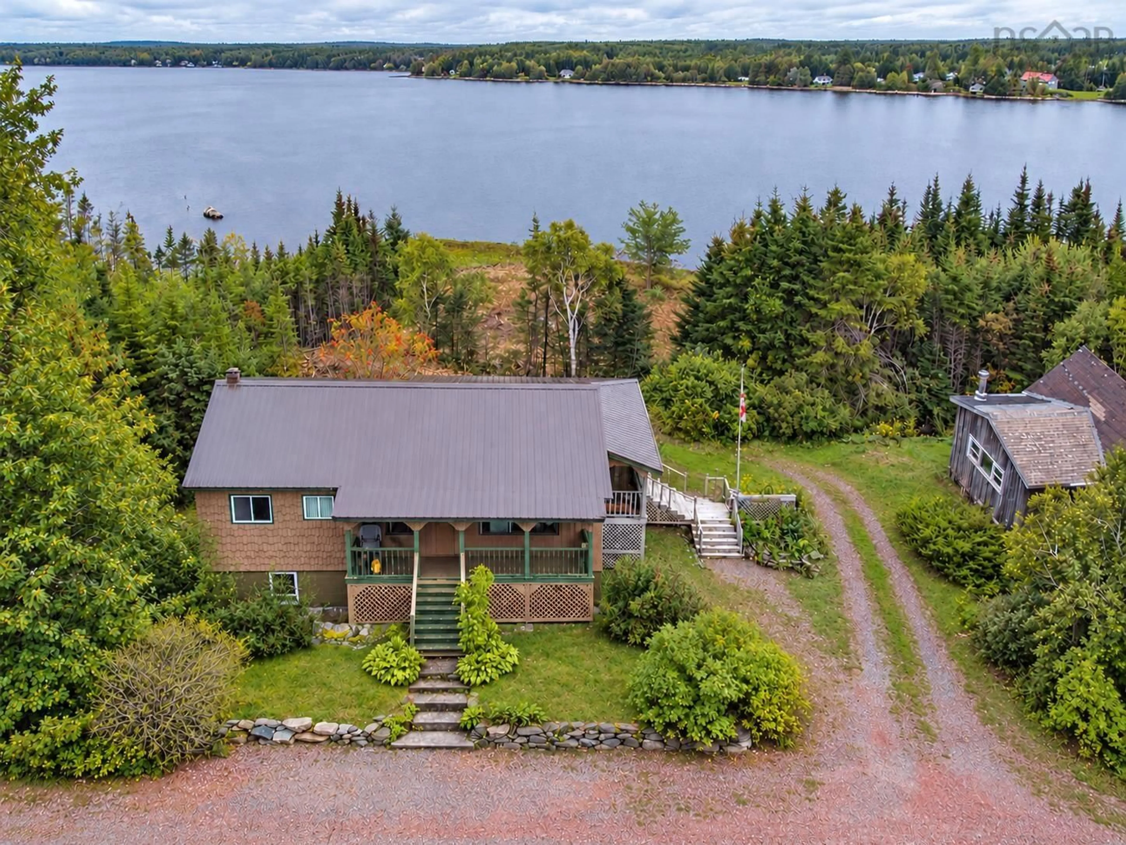 A pic from outside/outdoor area/front of a property/back of a property/a pic from drone, water/lake/river/ocean view for 4578 Highway 7, Spanish Ship Bay Nova Scotia B0J 2A0