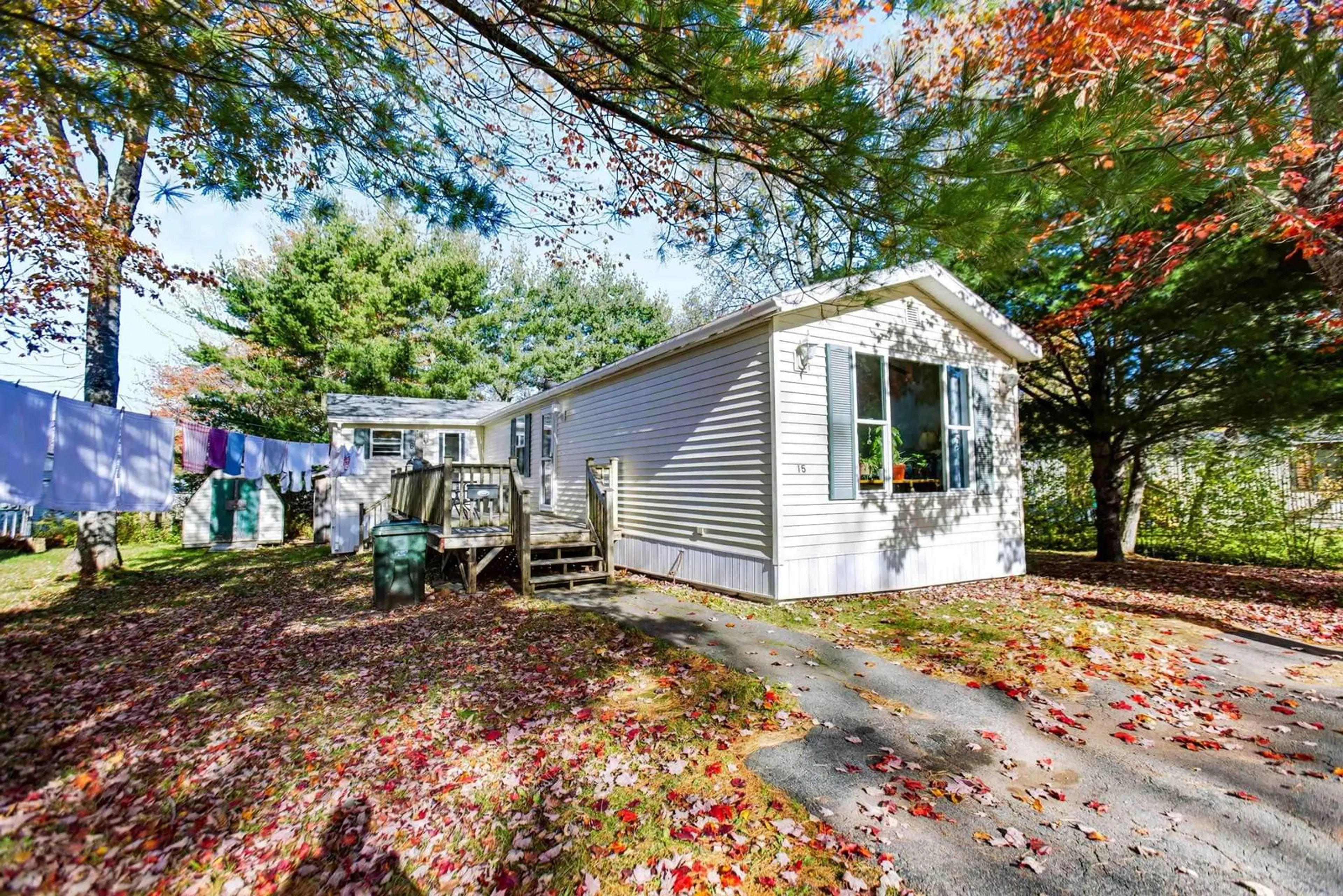 Home with vinyl exterior material, street for 15 Woodlawn Dr, Amherst Nova Scotia B4H 4K5