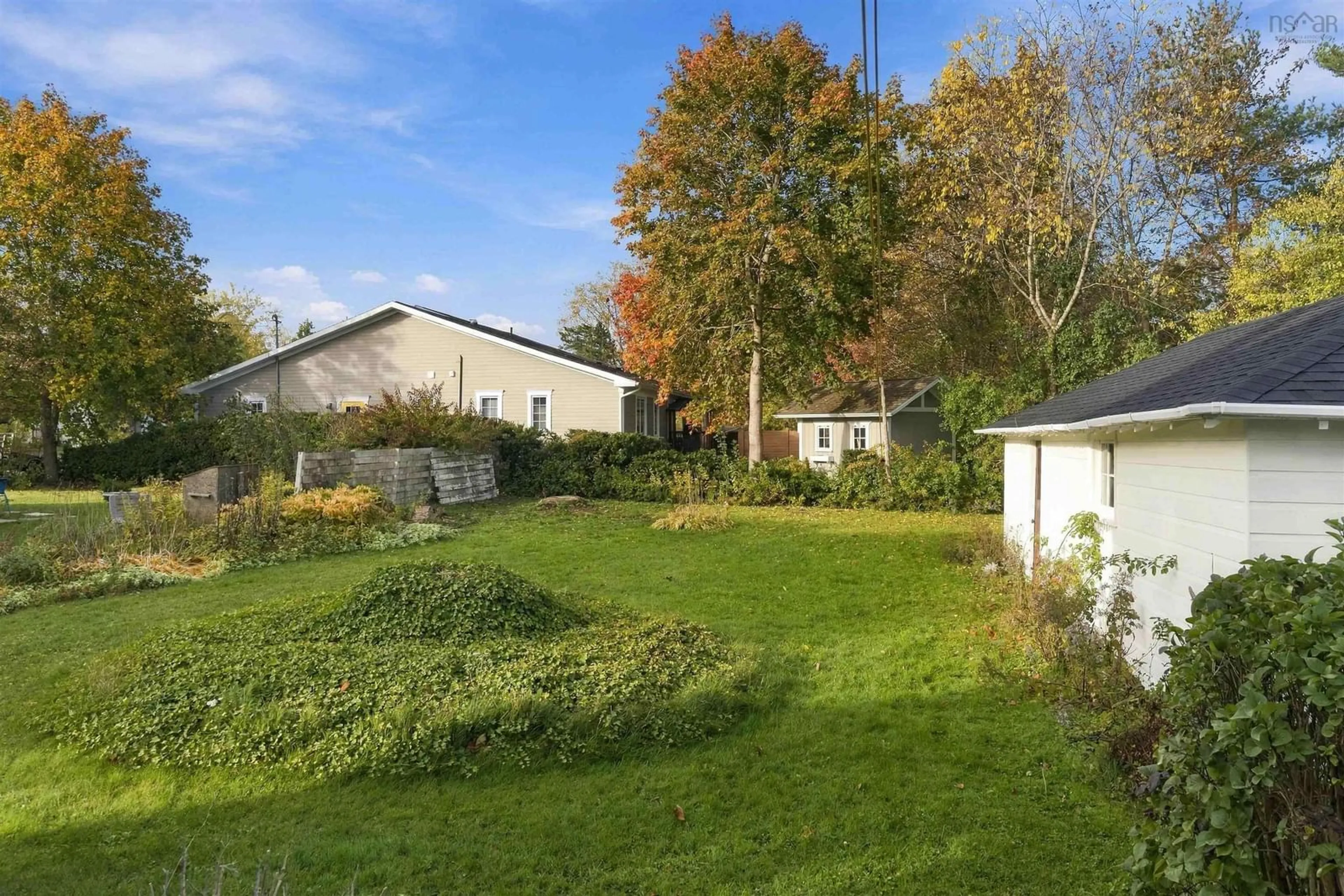 A pic from outside/outdoor area/front of a property/back of a property/a pic from drone, forest/trees view for 22 Hillside Ave, Wolfville Nova Scotia B4P 2B1