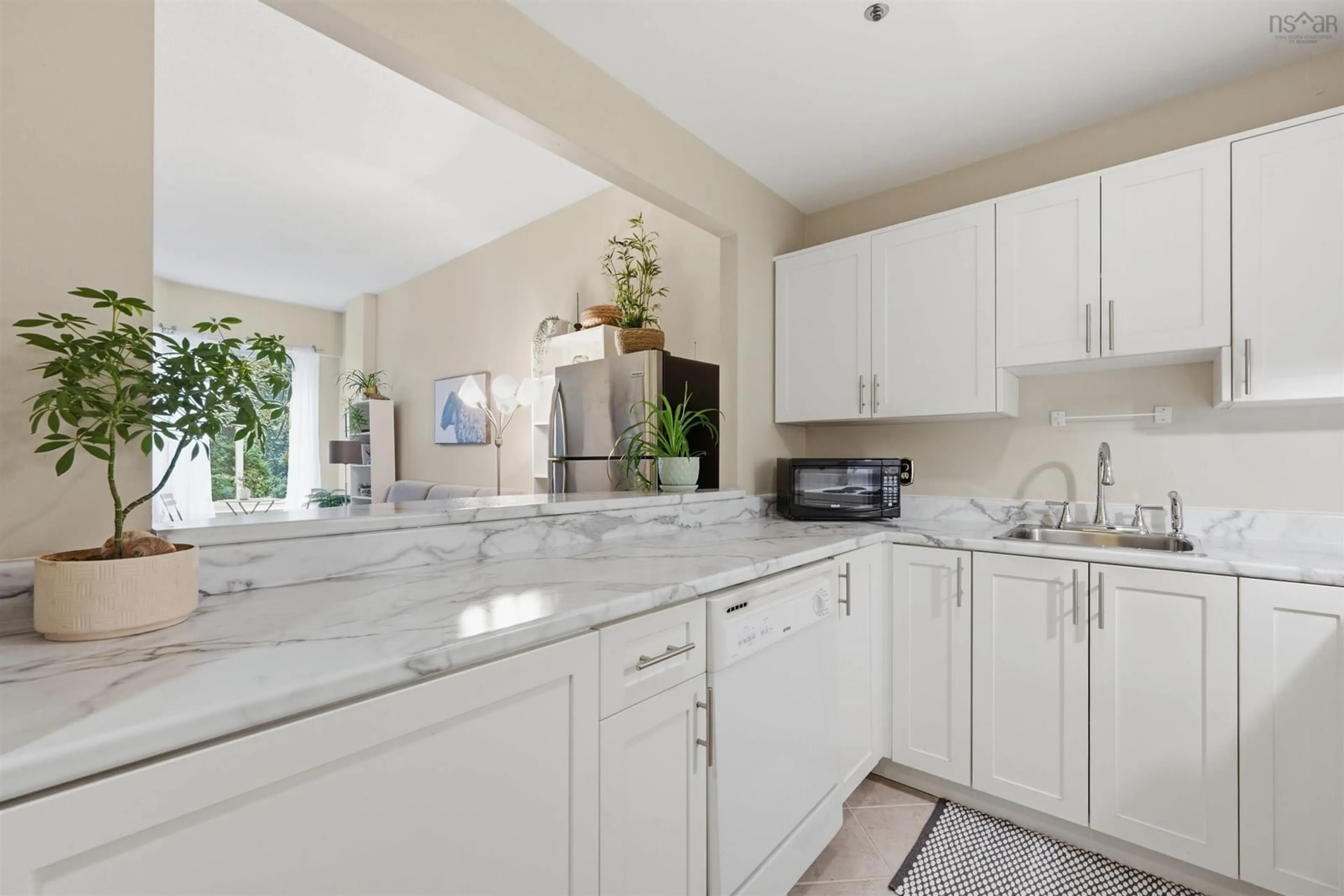 Open concept kitchen, ceramic/tile floor for 1326 Lower Water St #110, Halifax Nova Scotia B3J 3R3