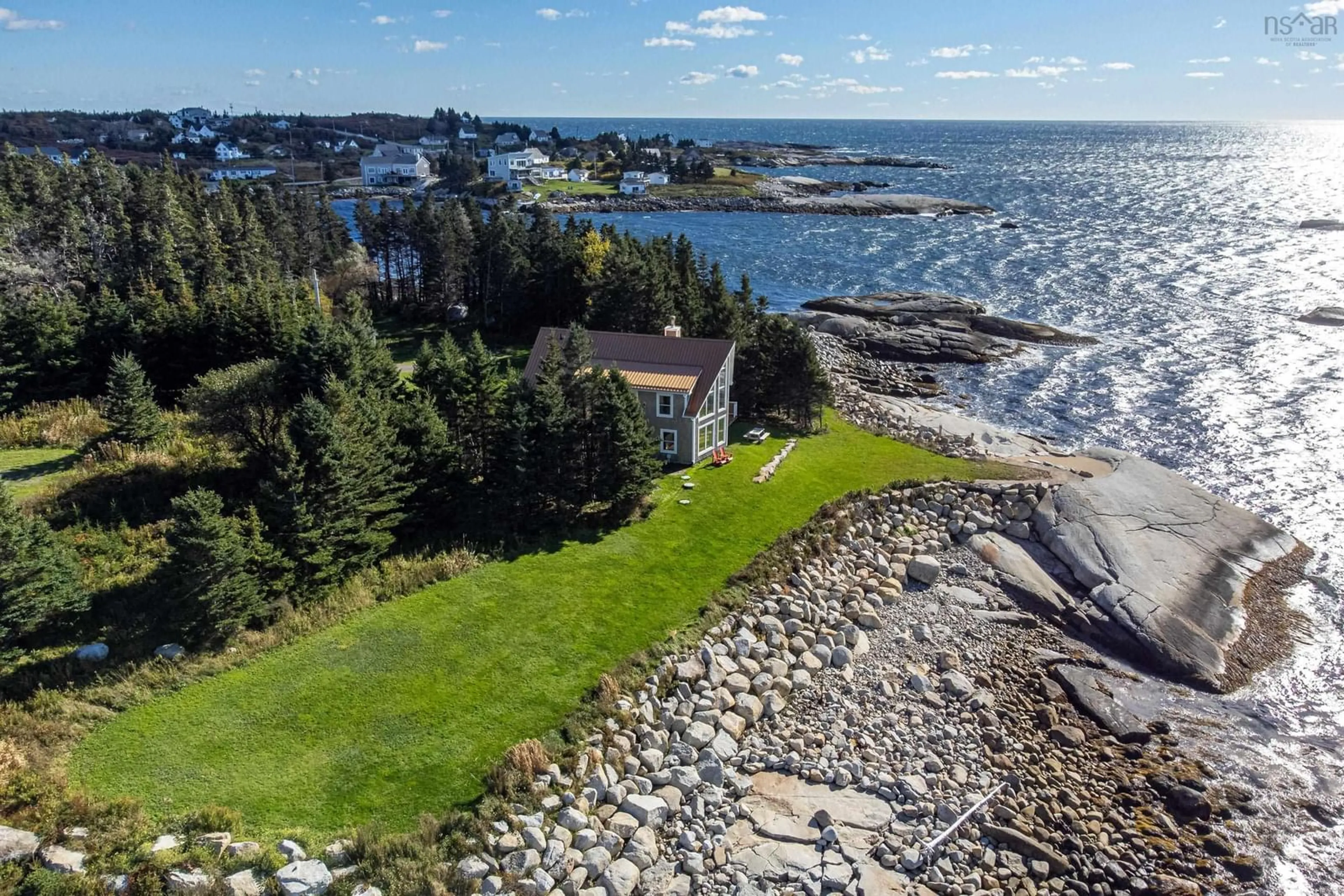 A pic from outside/outdoor area/front of a property/back of a property/a pic from drone, water/lake/river/ocean view for 19 Ryers Rd, Indian Harbour Nova Scotia B3Z 3P9