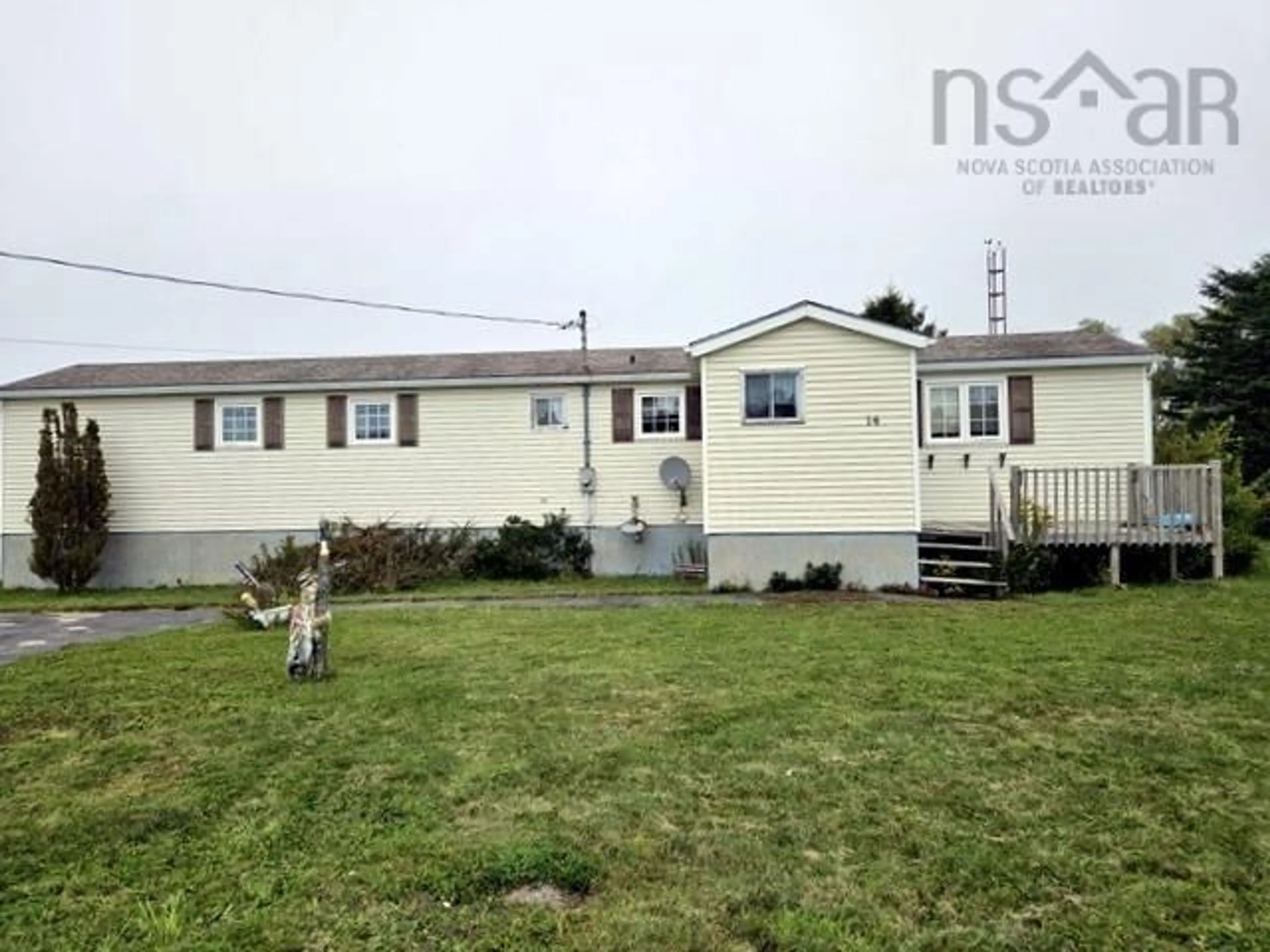 Home with vinyl exterior material, street for 14 Boundry St, Clark's Harbour Nova Scotia B0W 1P0