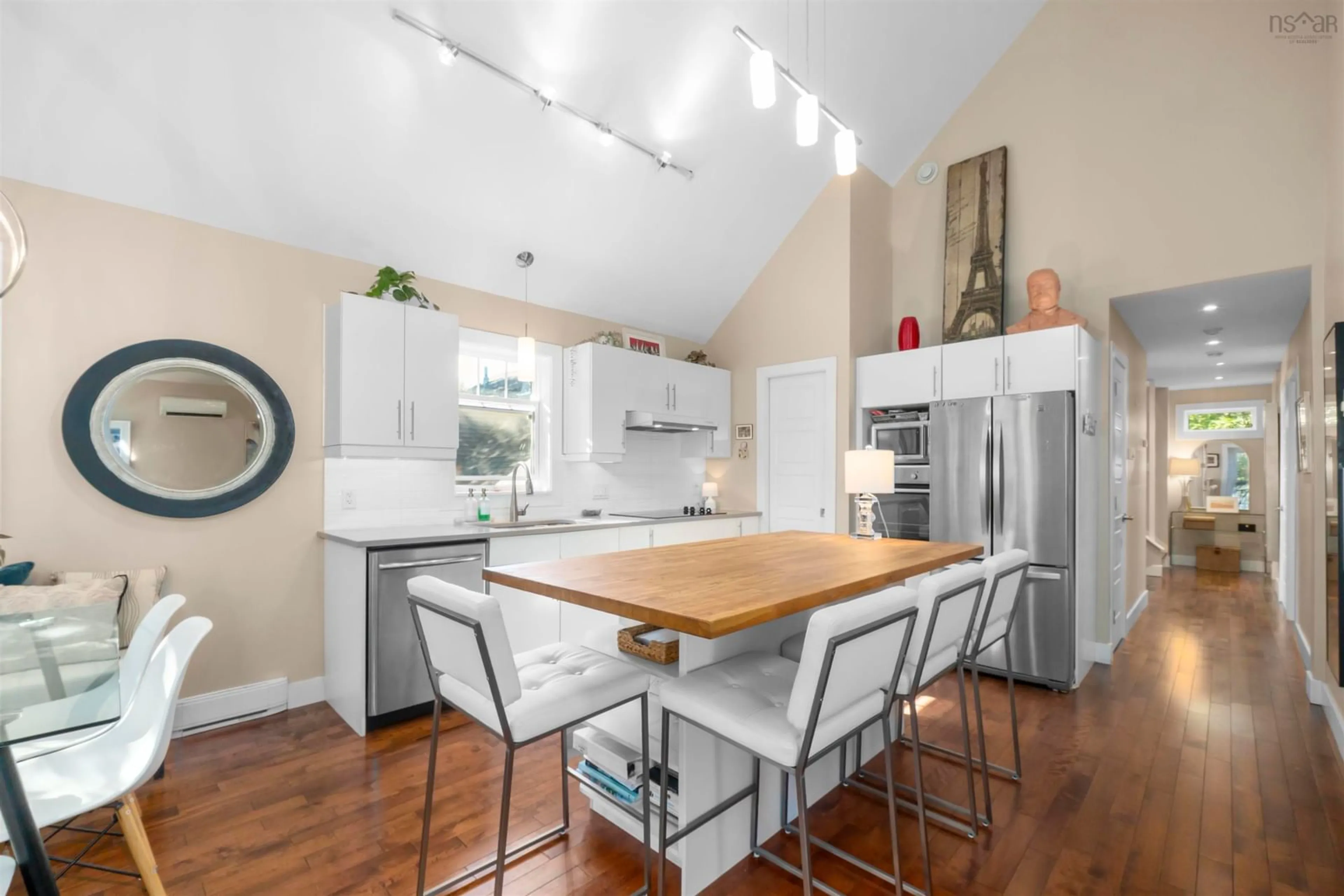 Open concept kitchen, wood/laminate floor for 2487 Davison St #A/B, Halifax Nova Scotia B3K 4K9