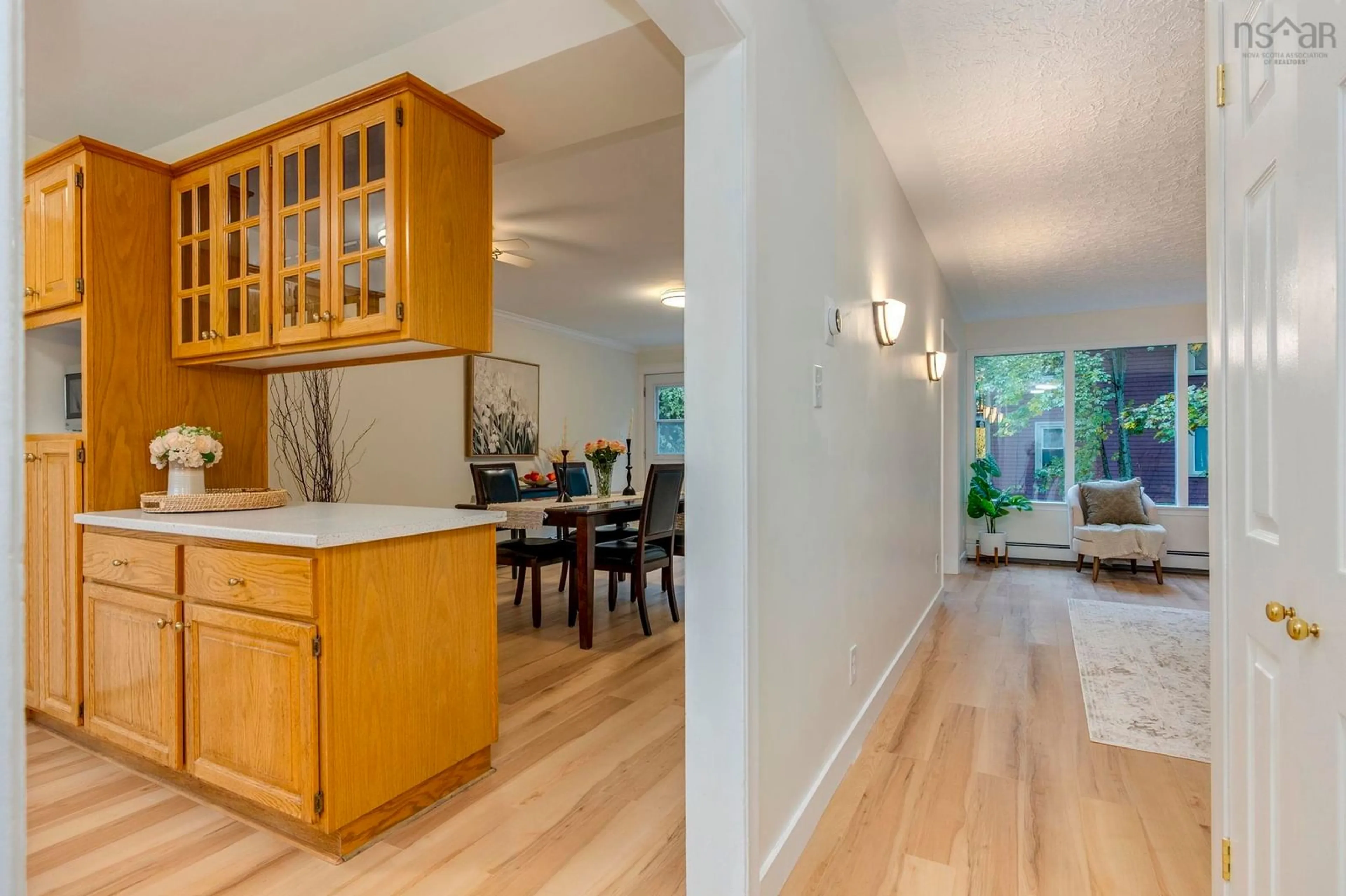 Open concept kitchen, wood/laminate floor for 5537 Atlantic St, Halifax Nova Scotia B3H 1G6