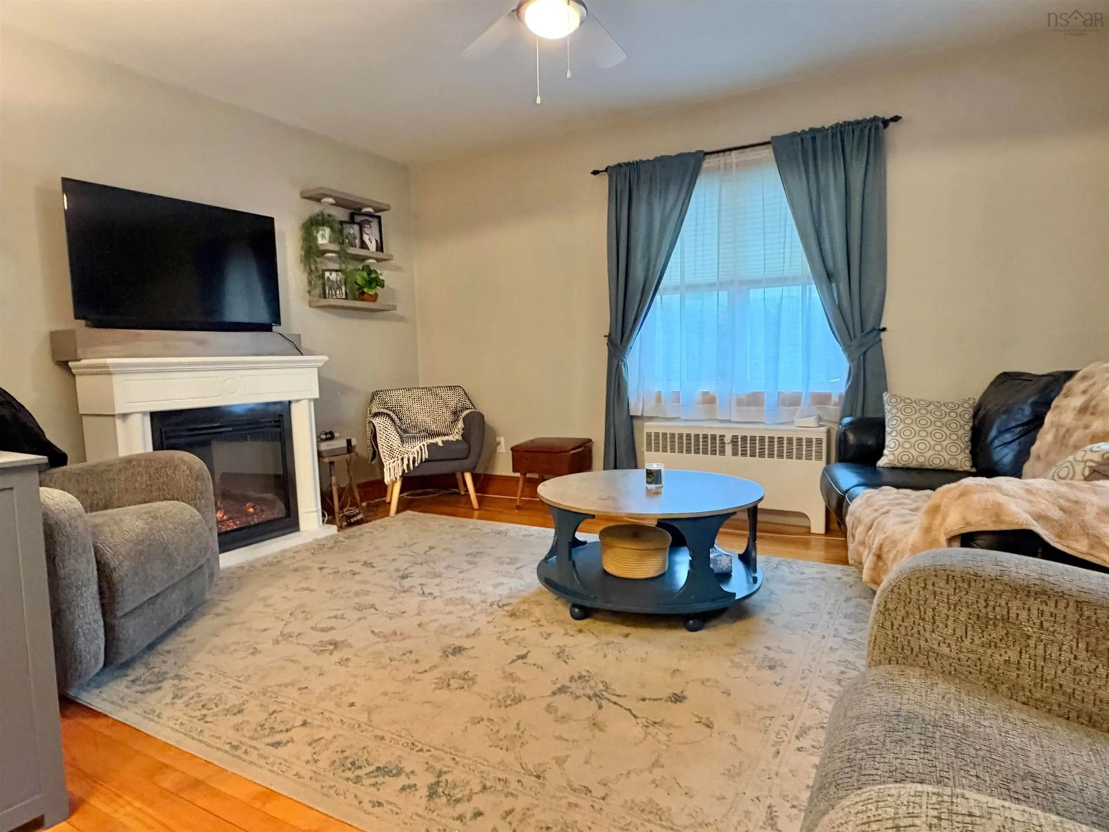 Living room with furniture, unknown for 13 Grand St, Yarmouth Nova Scotia B5A 2Z7