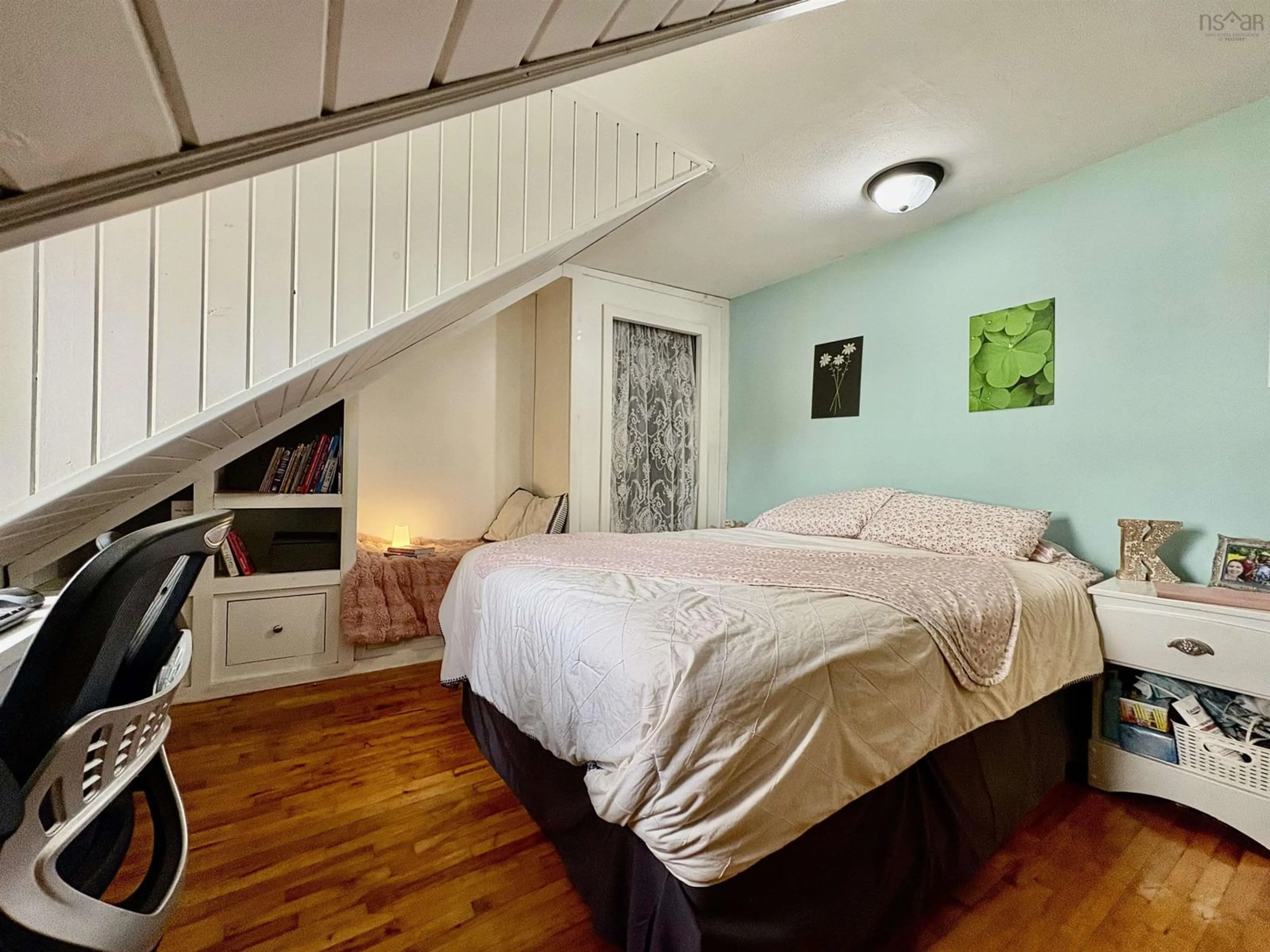 Bedroom with bed, wood/laminate floor for 2133 Spring Garden Rd, Westville Nova Scotia B0K 2A0