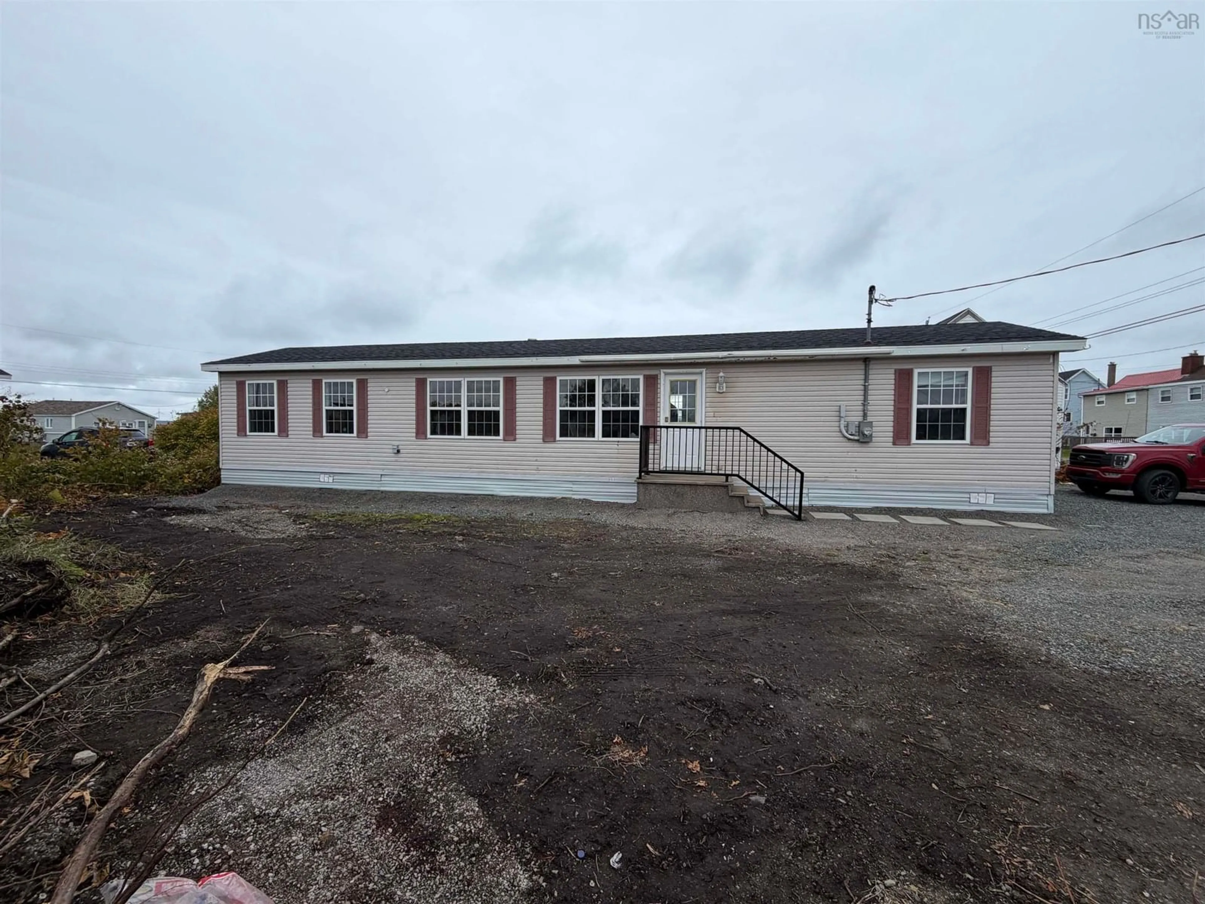 A pic from outside/outdoor area/front of a property/back of a property/a pic from drone, building for 23 Row St, Glace Bay Nova Scotia B1A 4T8