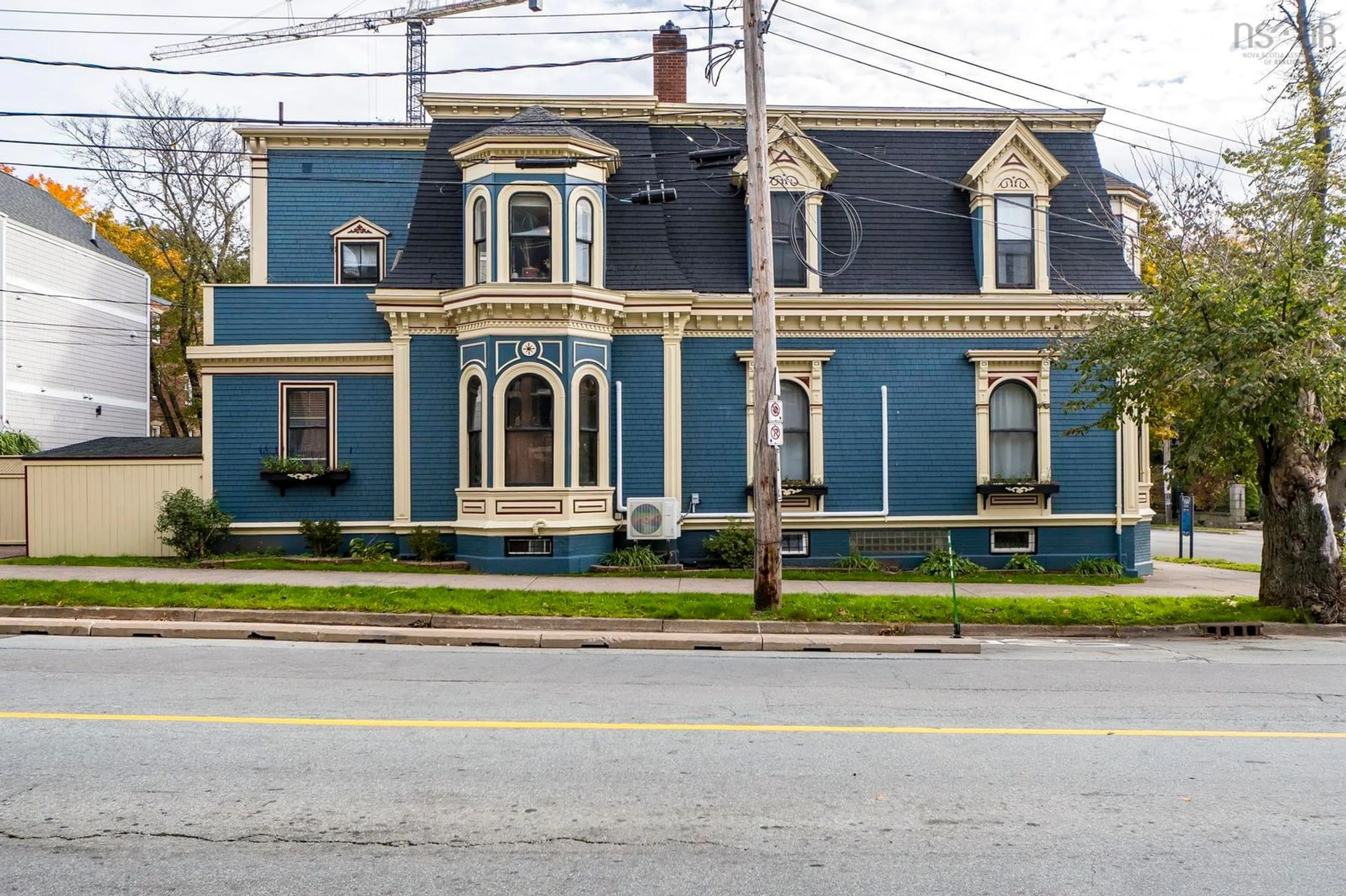 Home with vinyl exterior material, street for 5691 Inglis St, Halifax Nova Scotia B3H 1K2