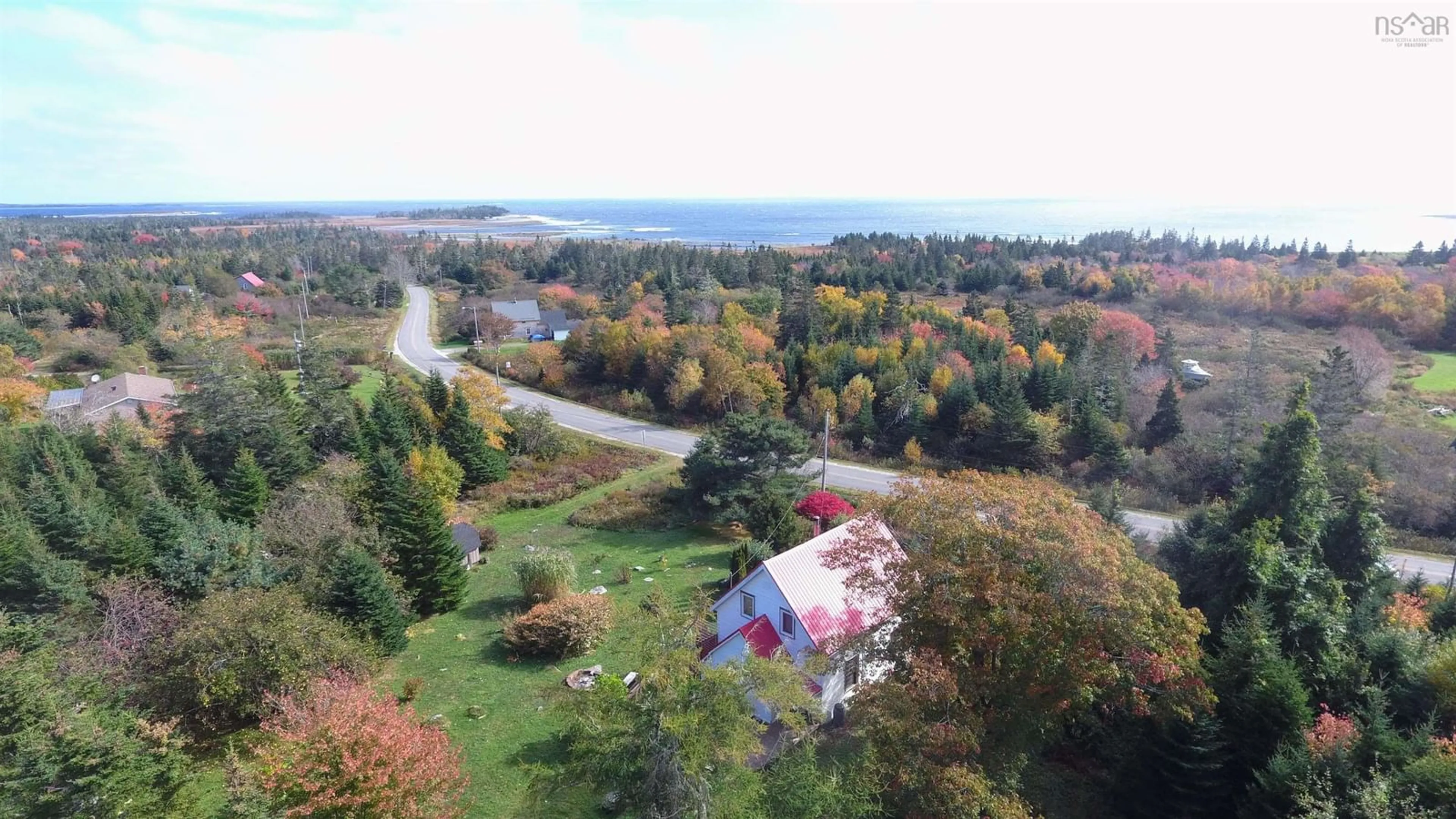 A pic from outside/outdoor area/front of a property/back of a property/a pic from drone, water/lake/river/ocean view for 2384 West Sable Rd, Little Harbour Nova Scotia B0T 1V0