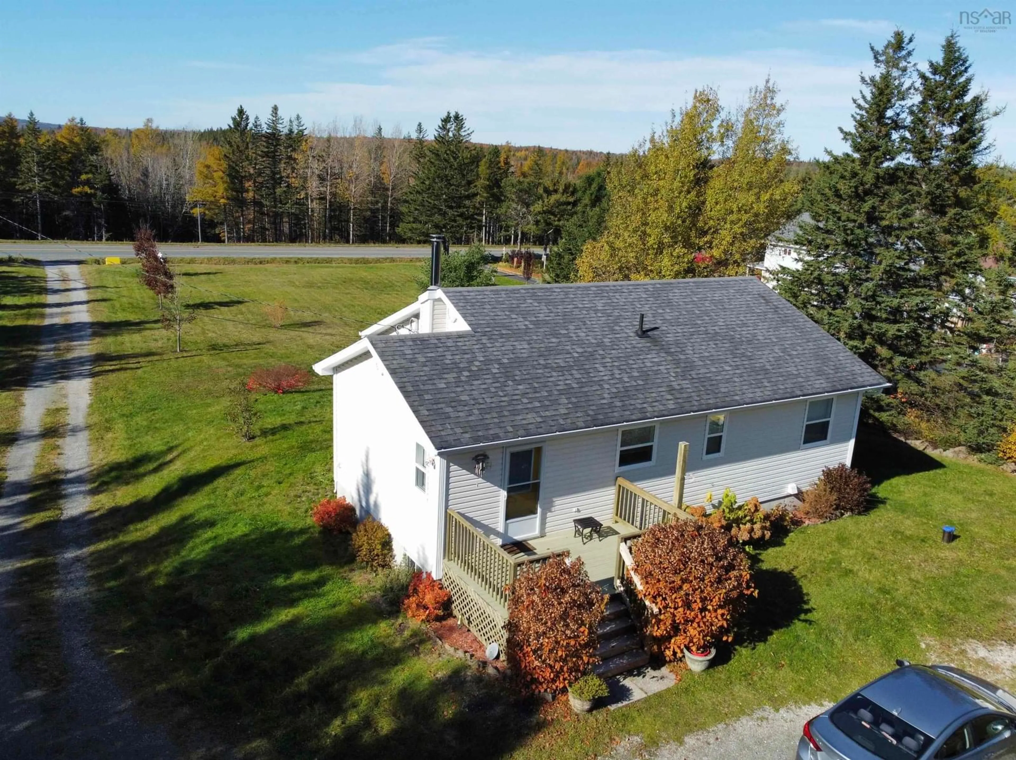 A pic from outside/outdoor area/front of a property/back of a property/a pic from drone, building for 1619 Gabarus Hwy, Sydney Nova Scotia B1L 1E8