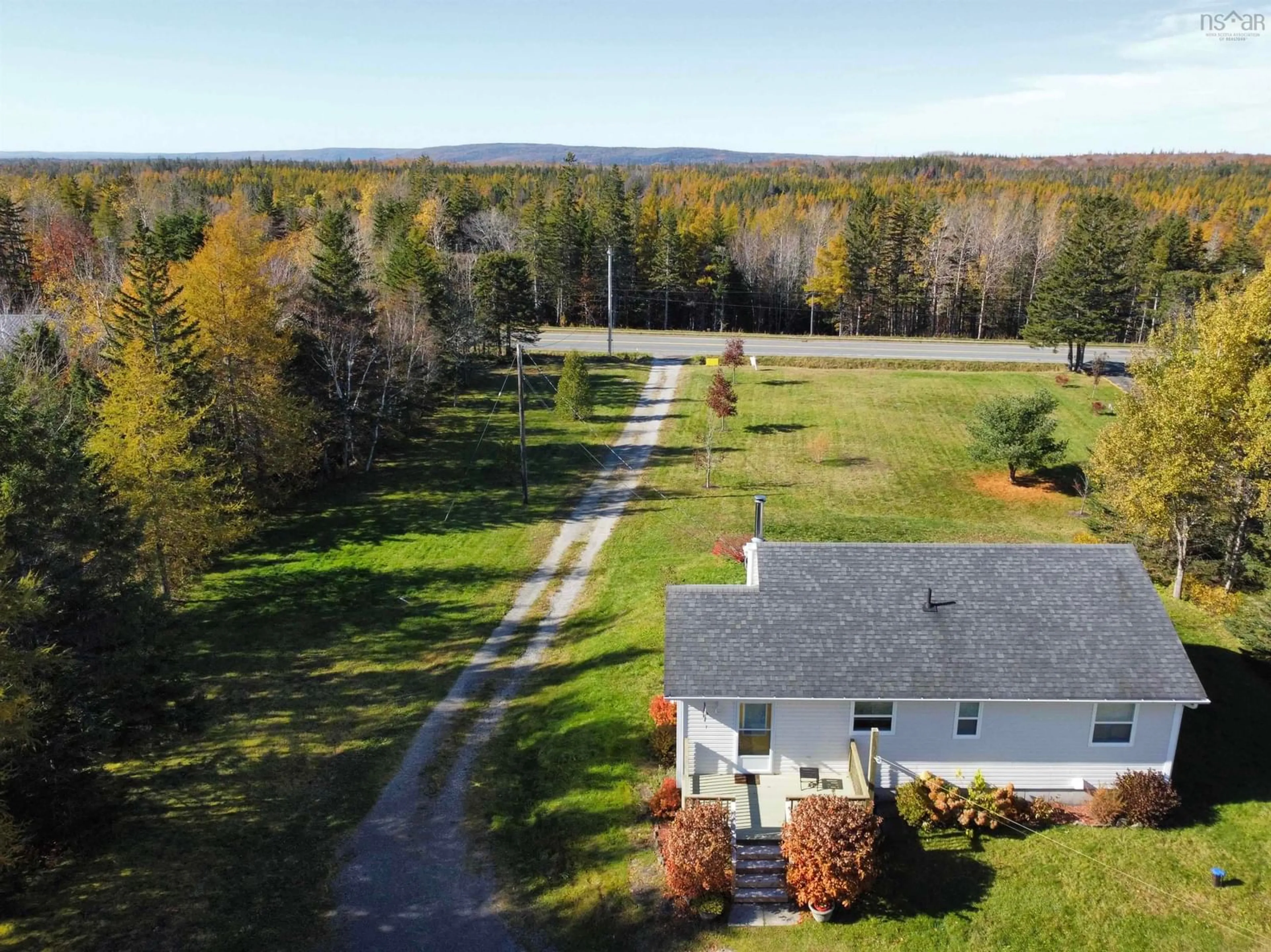 A pic from outside/outdoor area/front of a property/back of a property/a pic from drone, unknown for 1619 Gabarus Hwy, Sydney Nova Scotia B1L 1E8