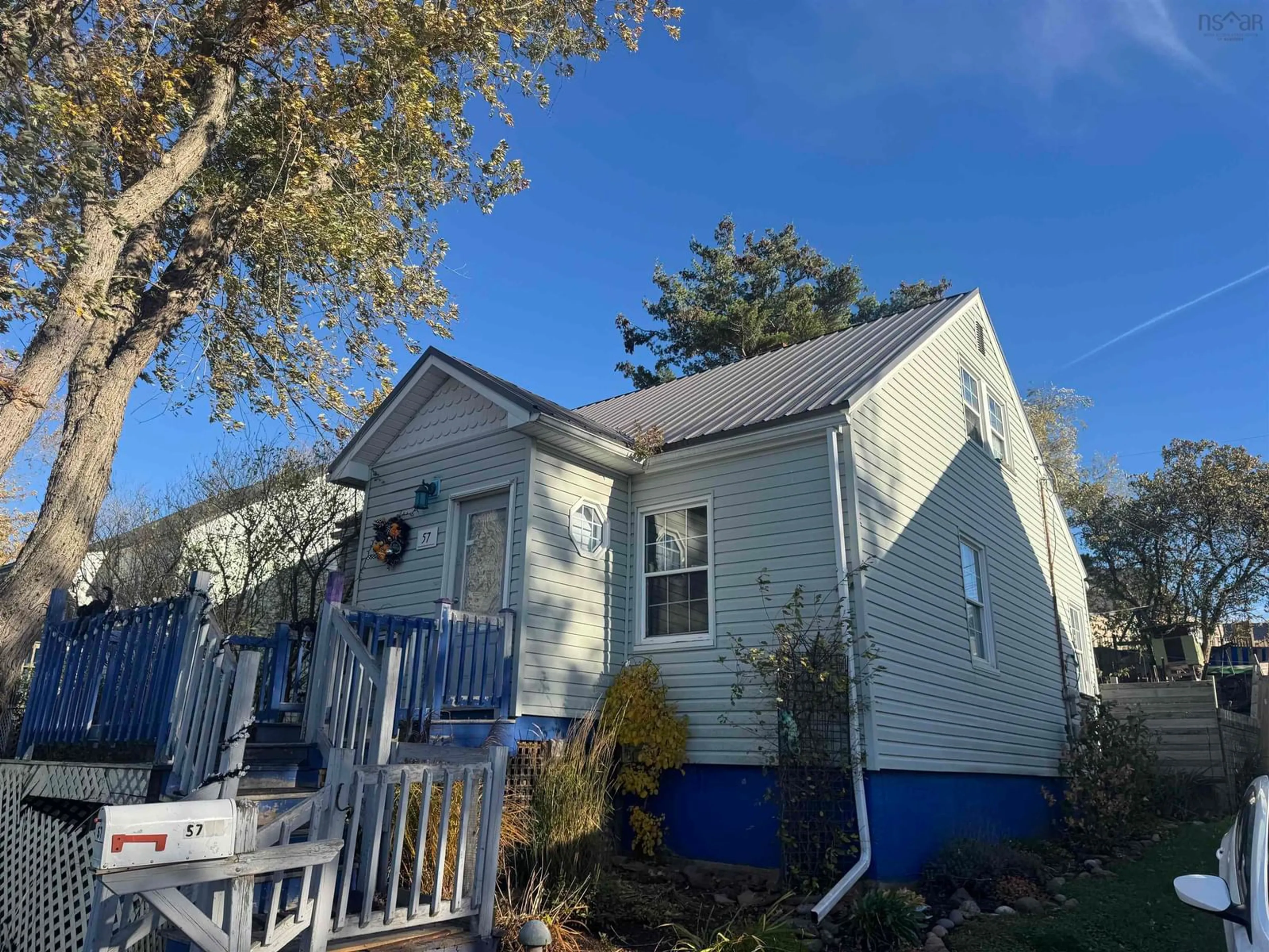 Home with vinyl exterior material, street for 57 Highland, New Glasgow Nova Scotia B2H 4C6