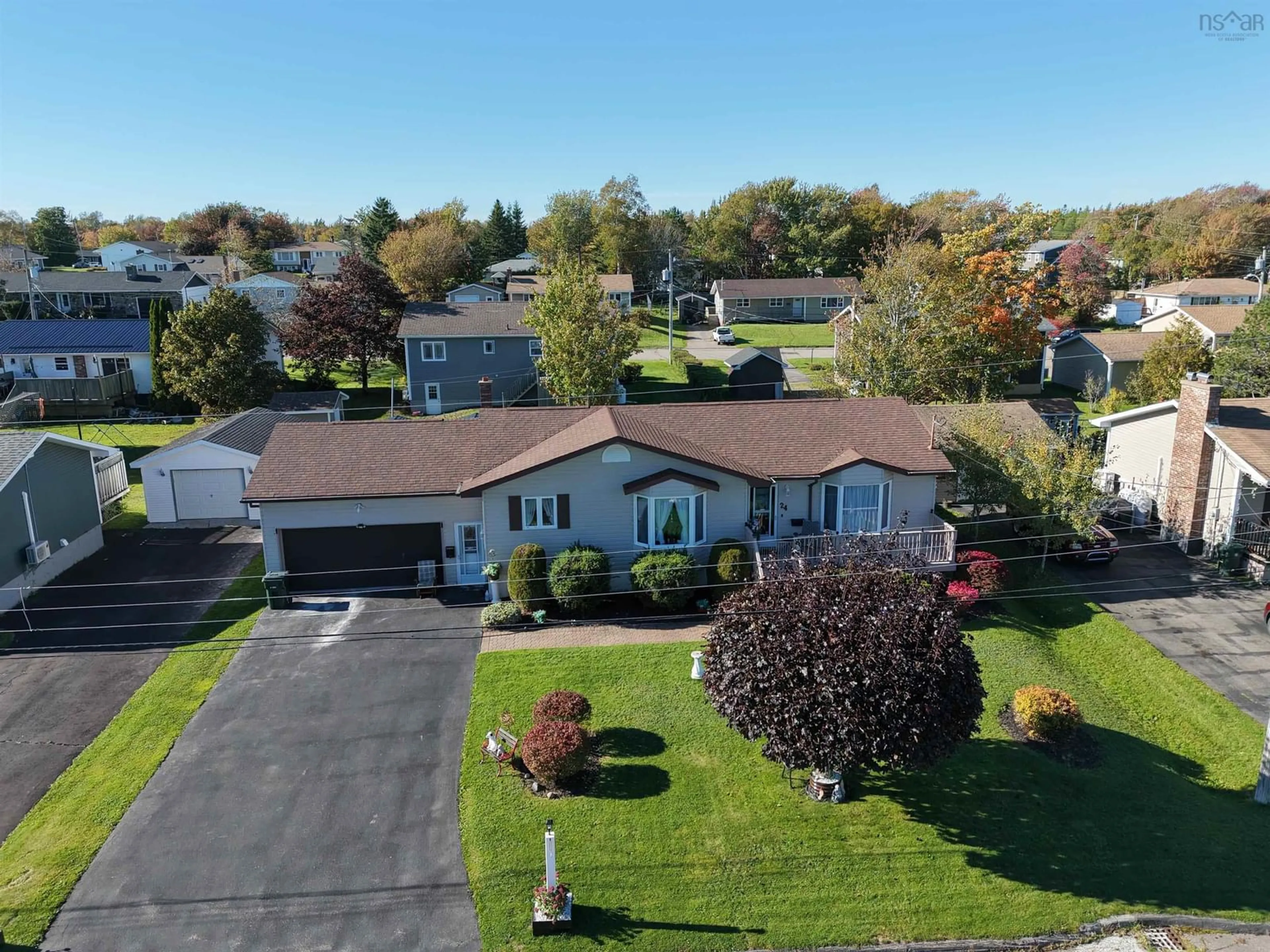 A pic from outside/outdoor area/front of a property/back of a property/a pic from drone, street for 24 Andrews Avenue, Coxheath Nova Scotia B1R 2H4