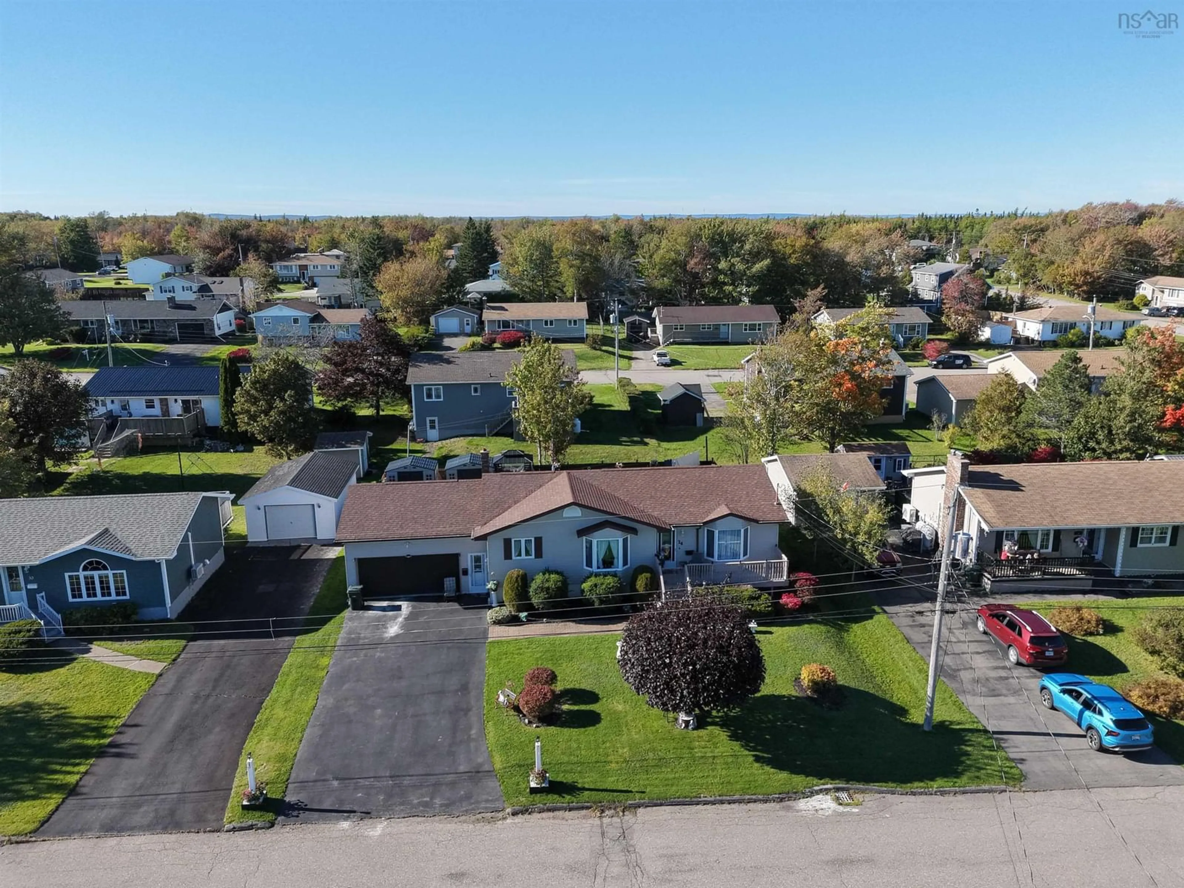 A pic from outside/outdoor area/front of a property/back of a property/a pic from drone, street for 24 Andrews Avenue, Coxheath Nova Scotia B1R 2H4