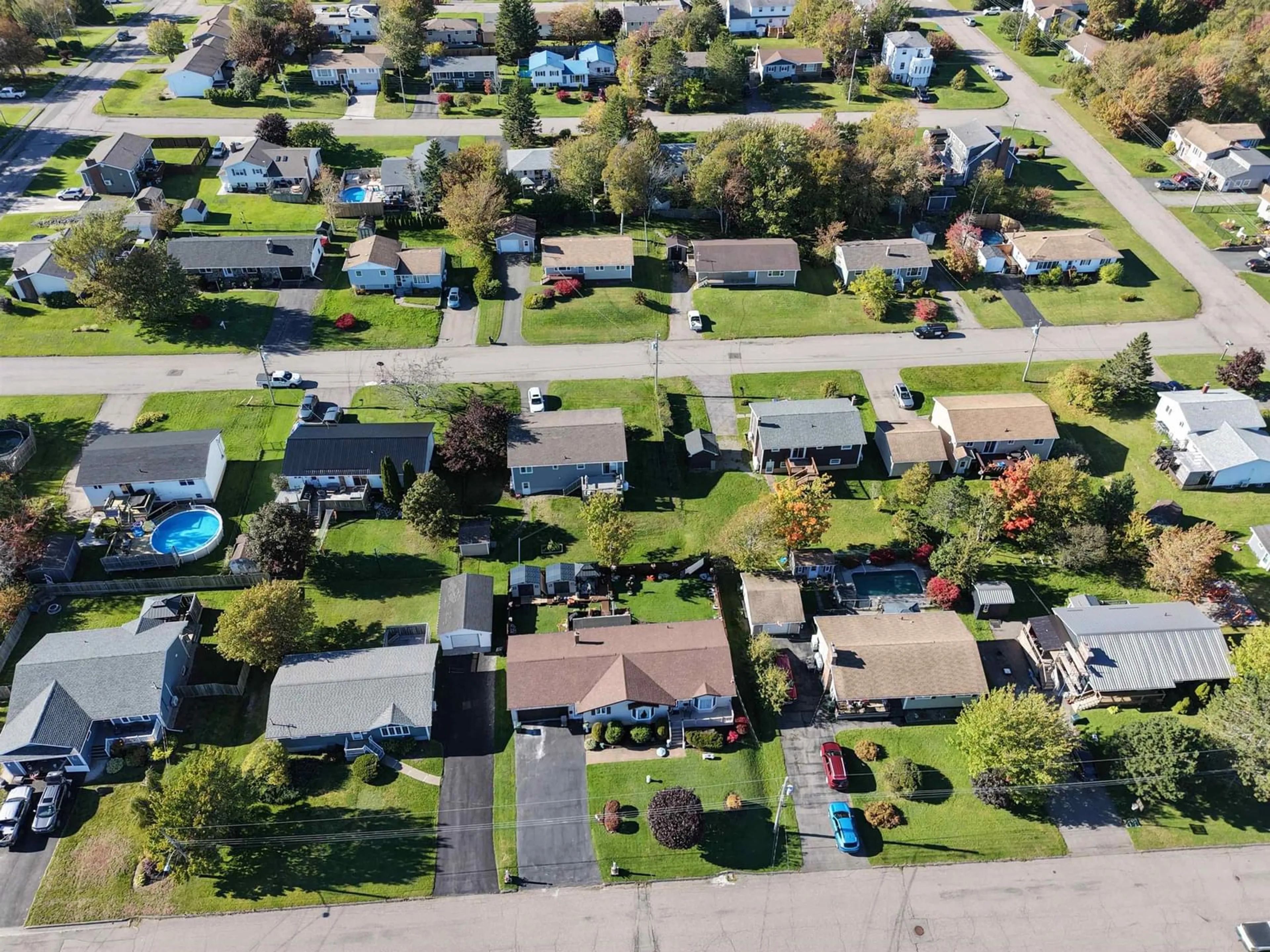 A pic from outside/outdoor area/front of a property/back of a property/a pic from drone, street for 24 Andrews Avenue, Coxheath Nova Scotia B1R 2H4