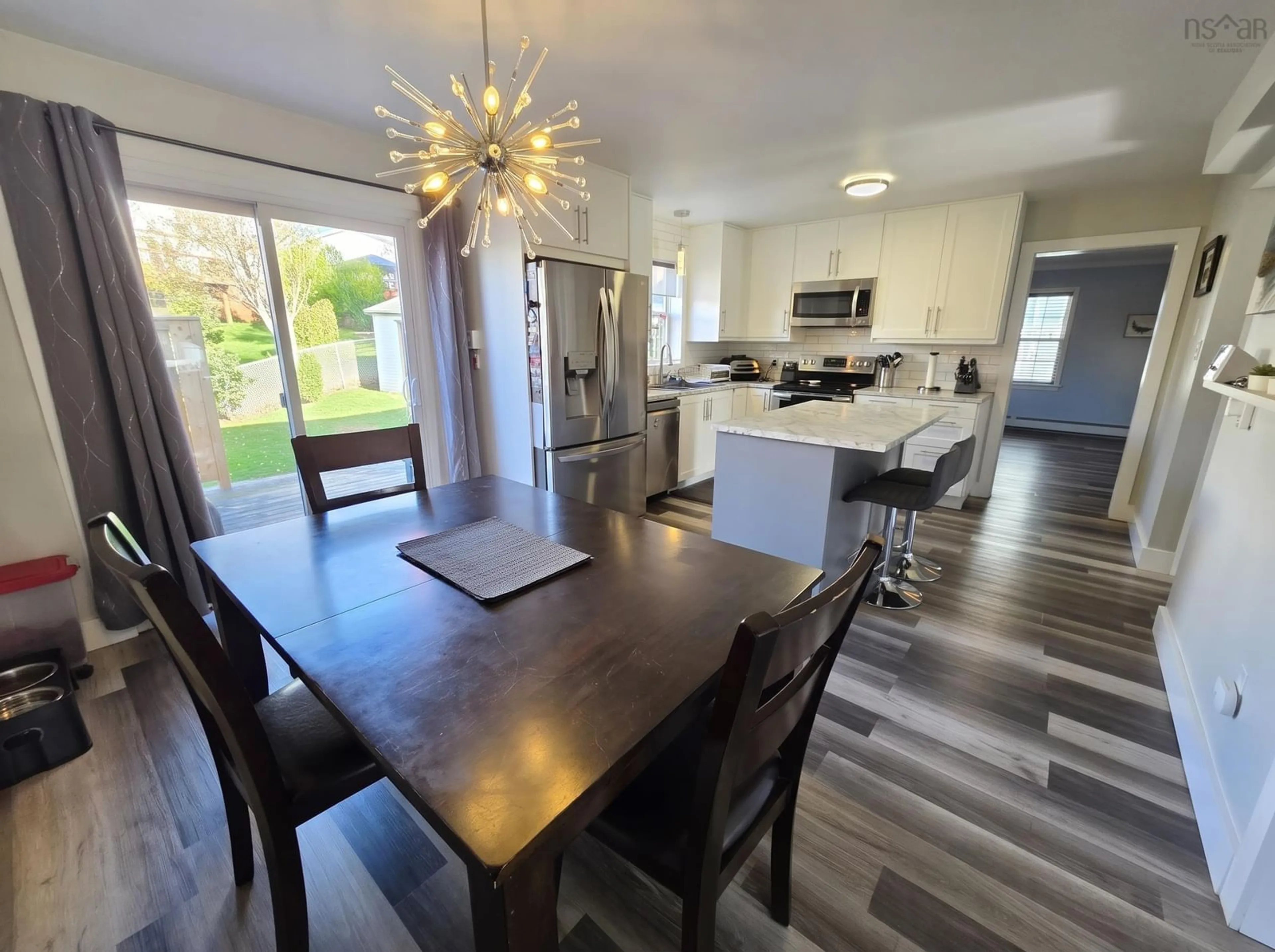 Open concept kitchen, wood/laminate floor for 64 Rossing Dr, Middle Sackville Nova Scotia B4E 3E5