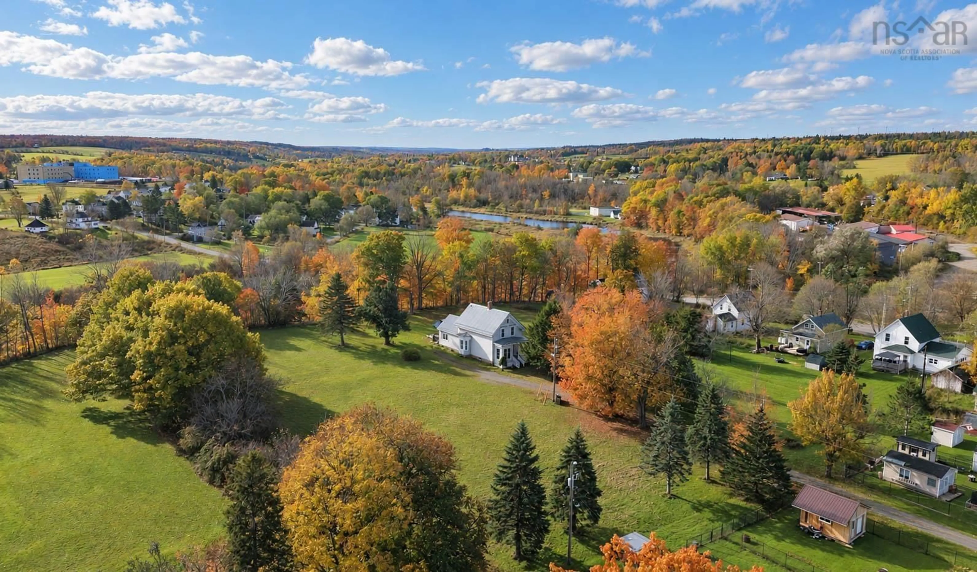 A pic from outside/outdoor area/front of a property/back of a property/a pic from drone, water/lake/river/ocean view for 110 River St, Stellarton Nova Scotia B0K 1S0