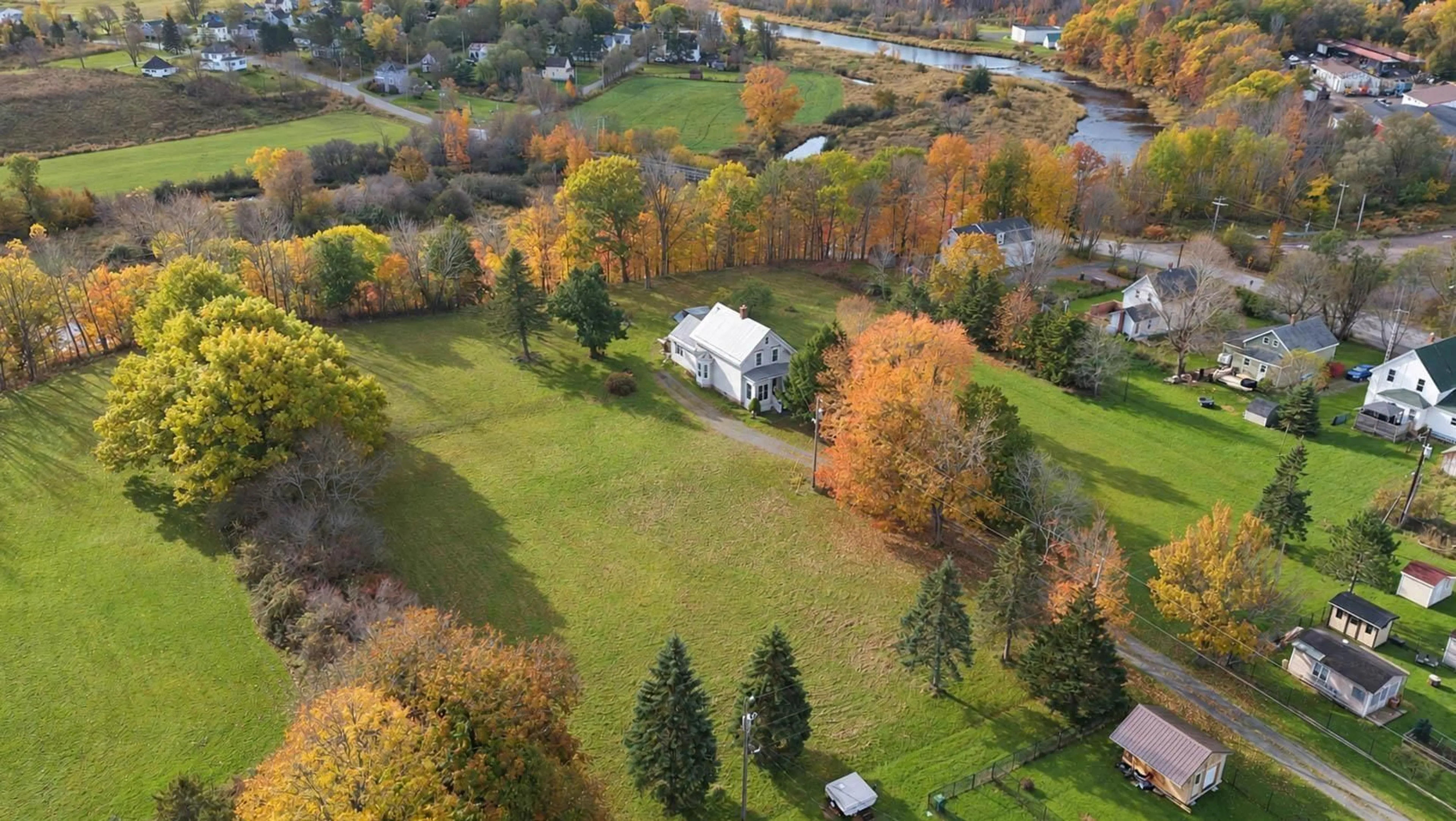 A pic from outside/outdoor area/front of a property/back of a property/a pic from drone, water/lake/river/ocean view for 110 River St, Stellarton Nova Scotia B0K 1S0