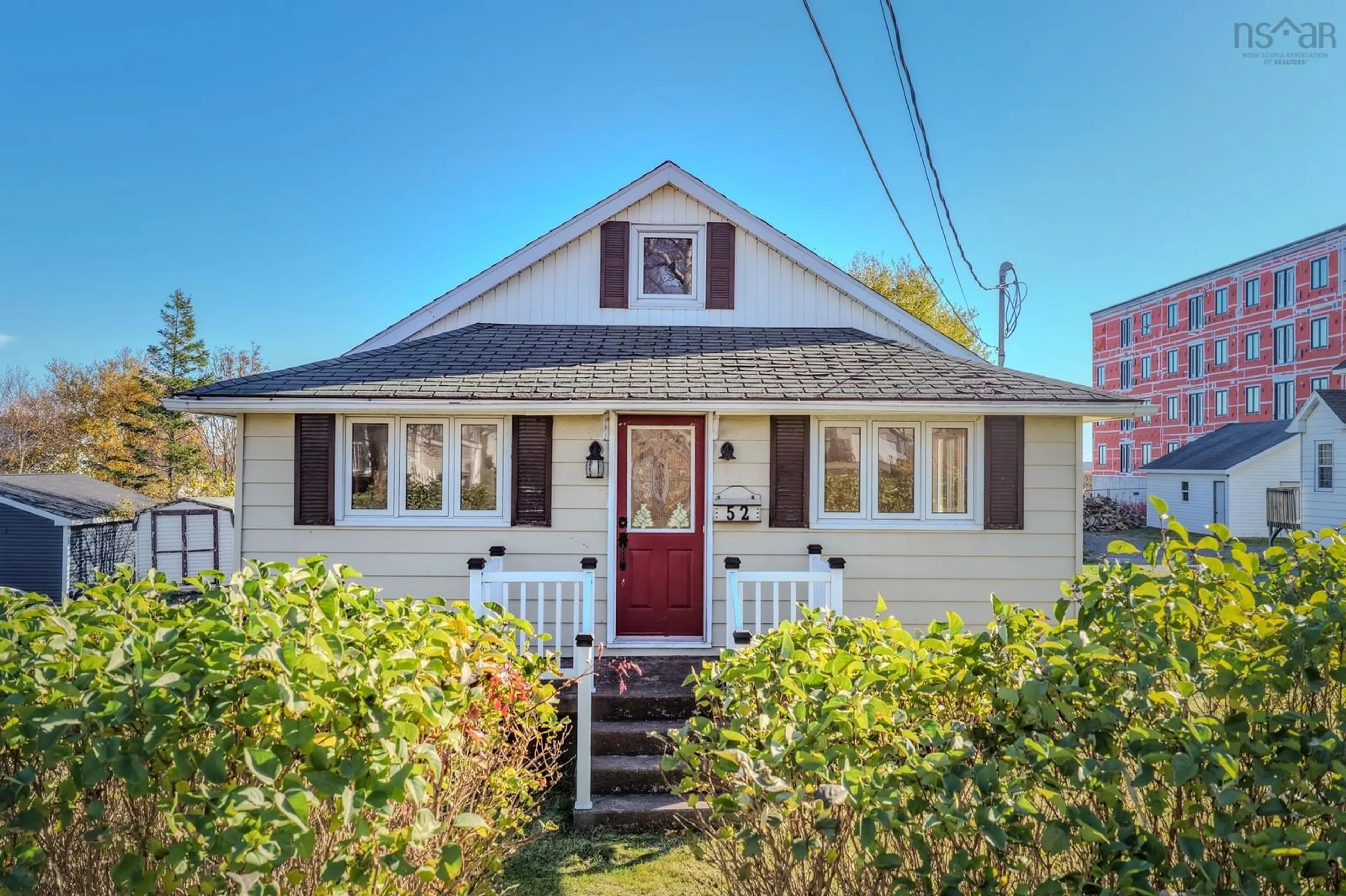 Home with vinyl exterior material, street for 52 Sterling Rd, Glace Bay Nova Scotia B1A 3X5