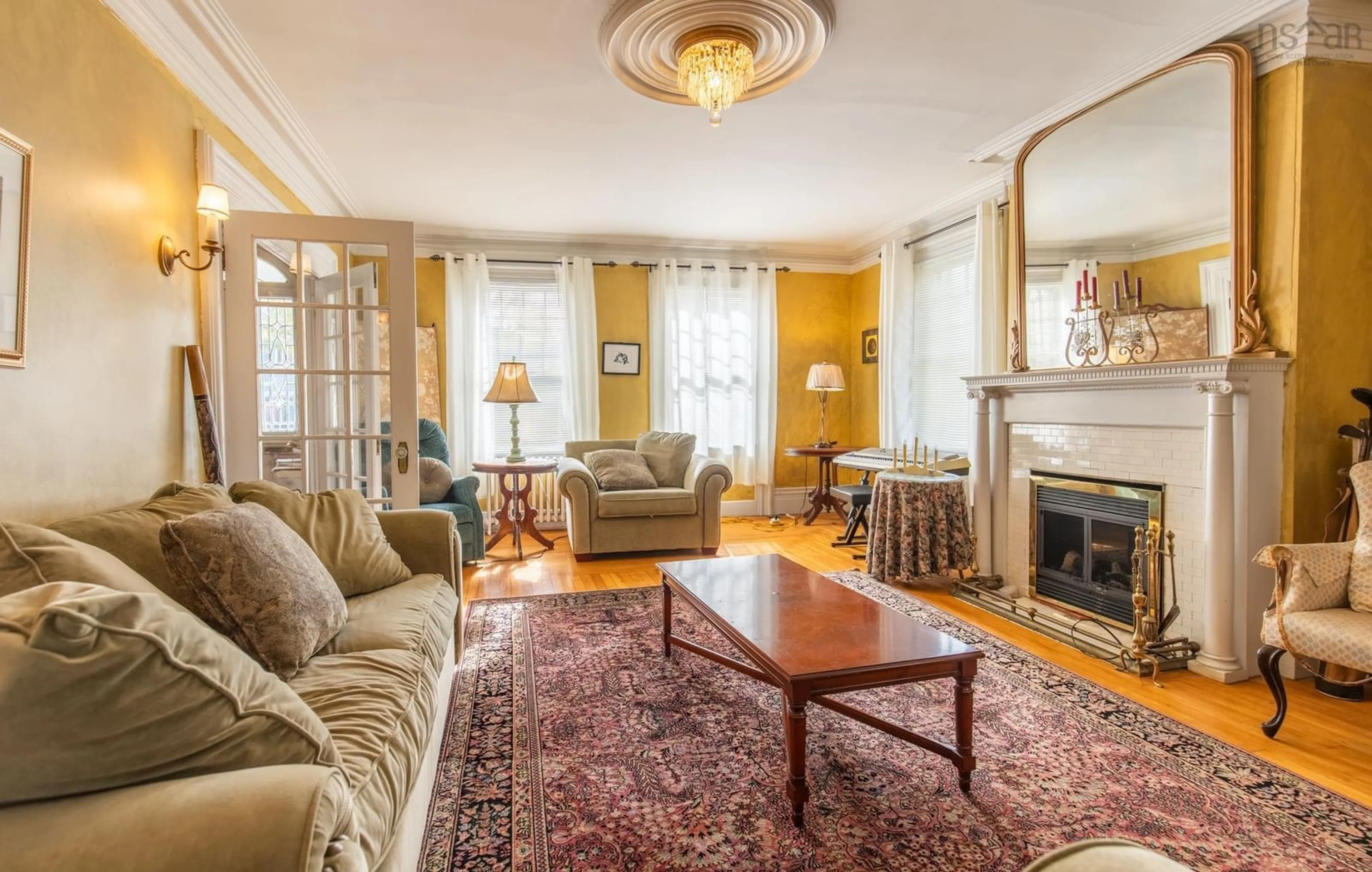 Living room with furniture, unknown for 14 Collins St, Yarmouth Nova Scotia B5A 3G6