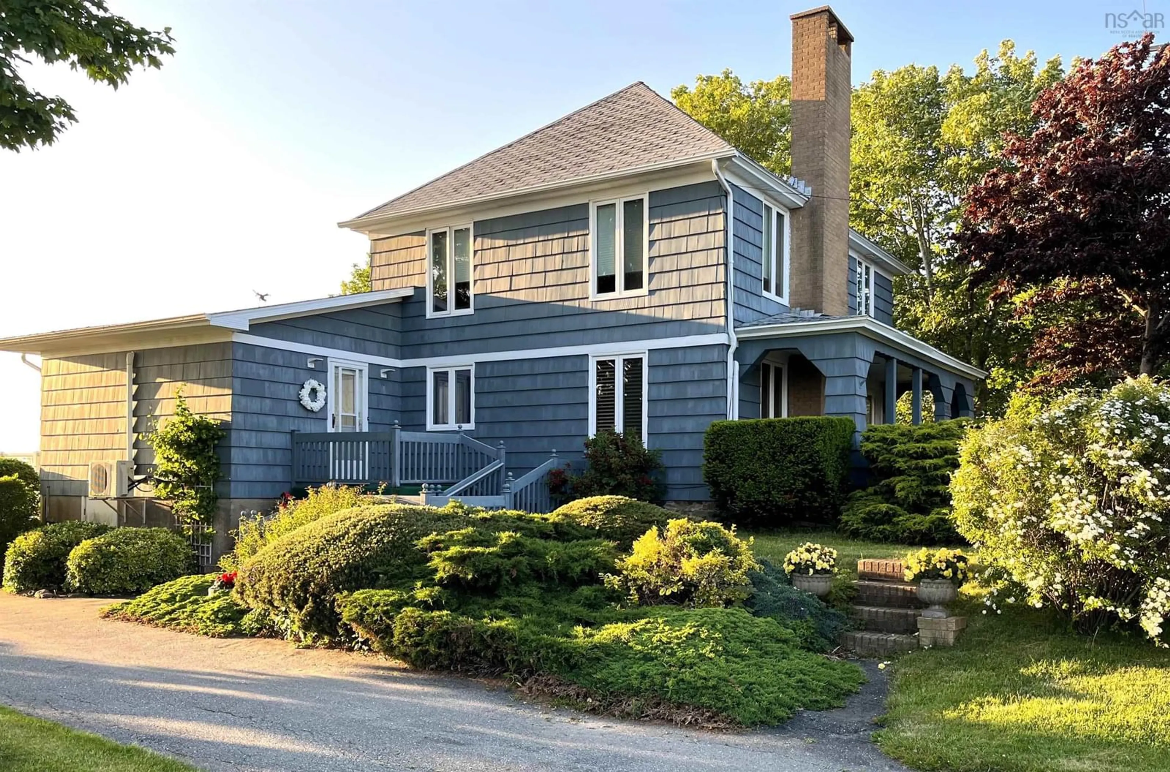 Home with vinyl exterior material, street for 3315 Highway 1, Belliveaus Cove Nova Scotia B0W 1J0