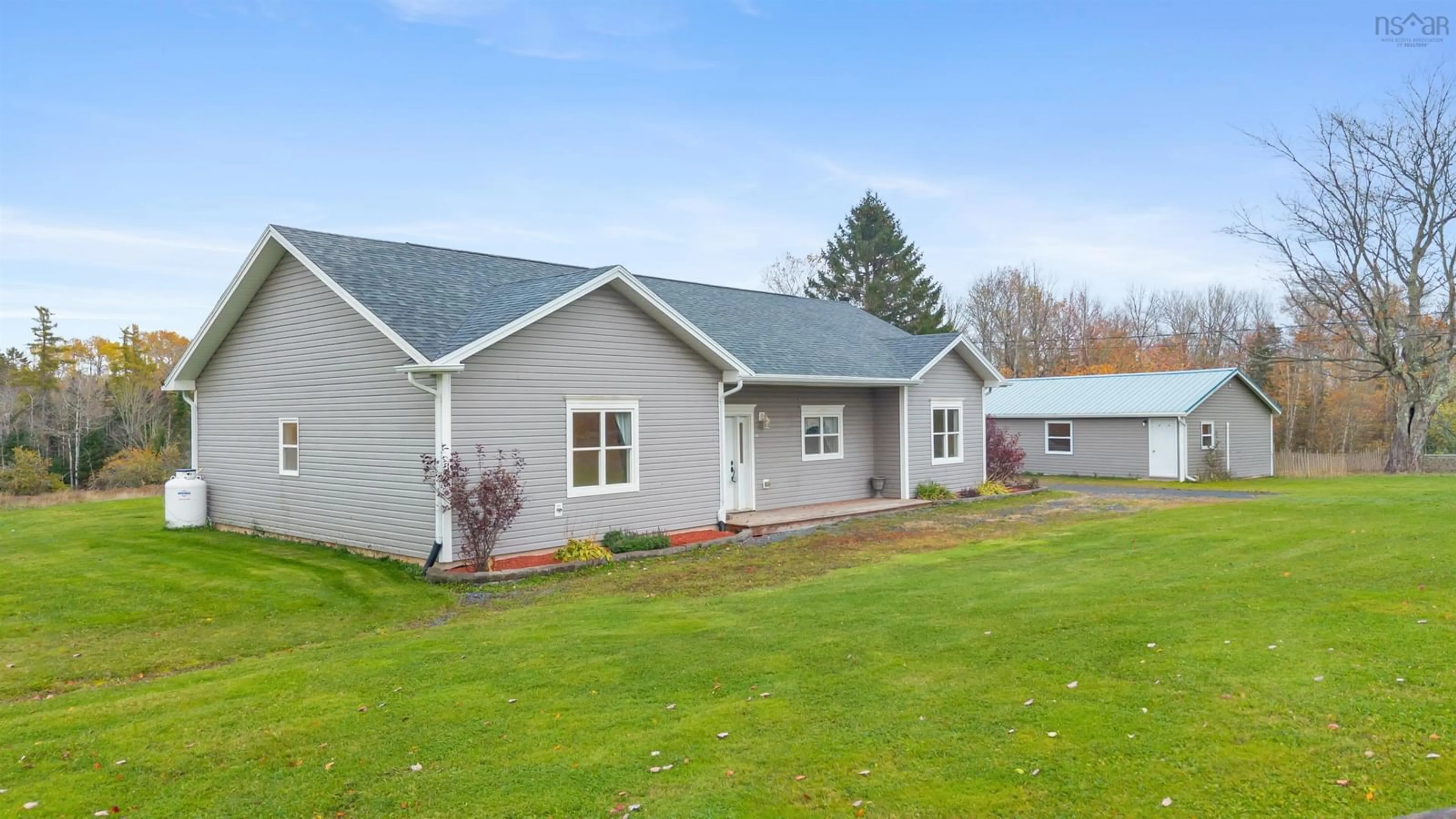 Home with vinyl exterior material, building for 6874 Highway 354, Kennetcook Nova Scotia B0N 1T0