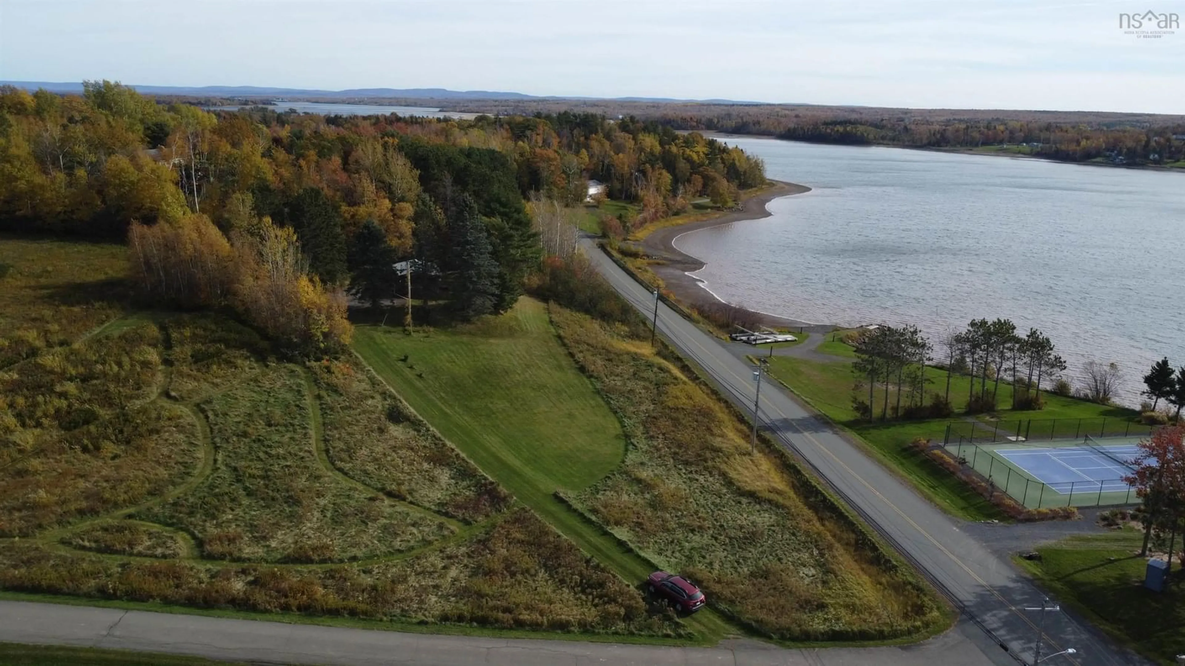 A pic from outside/outdoor area/front of a property/back of a property/a pic from drone, water/lake/river/ocean view for 4 Reid Lane, Black Point Nova Scotia B0K 1X0