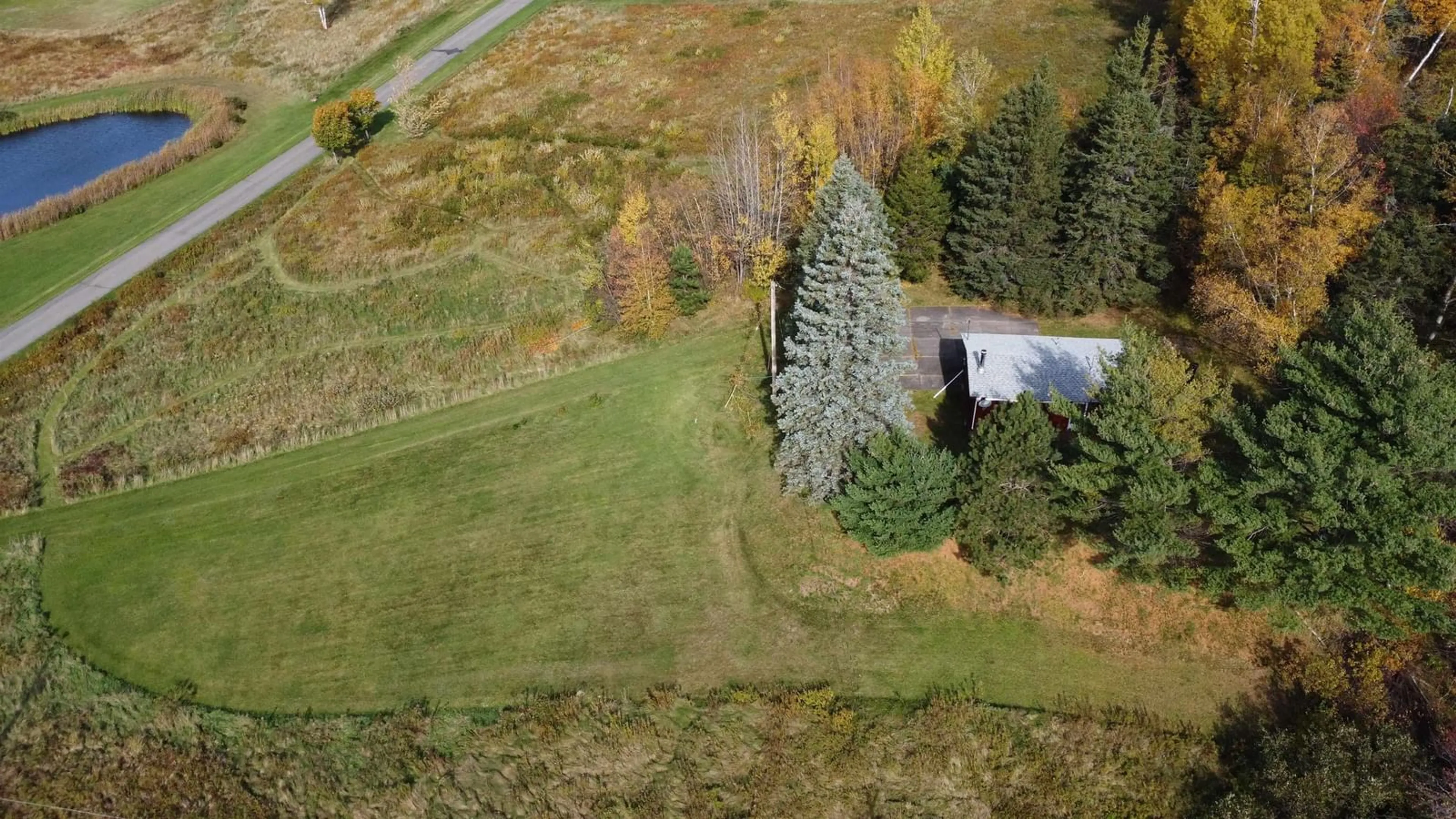 A pic from outside/outdoor area/front of a property/back of a property/a pic from drone, forest/trees view for 4 Reid Lane, Black Point Nova Scotia B0K 1X0