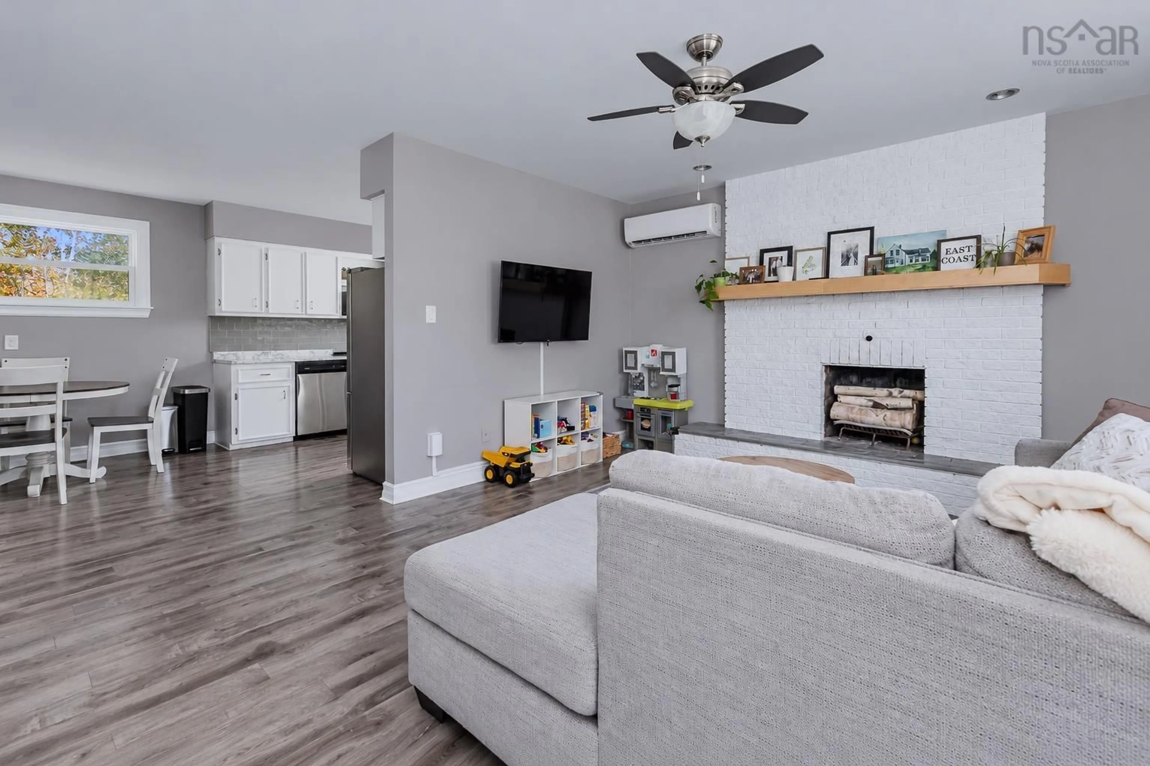 Living room with furniture, wood/laminate floor for 547 Cottage Road, Sydney Nova Scotia B1P 6S5