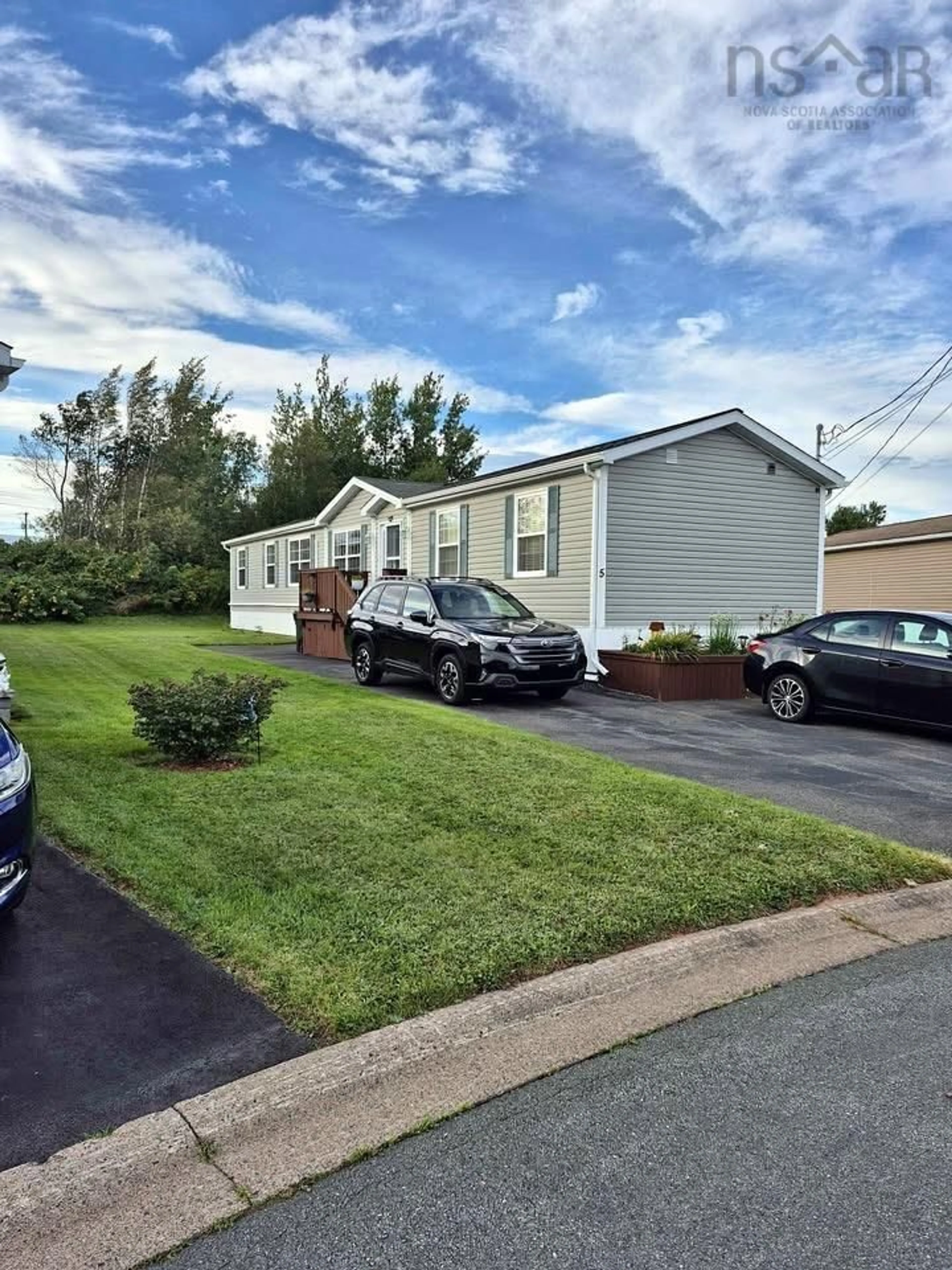 A pic from outside/outdoor area/front of a property/back of a property/a pic from drone, street for 5 Cambridge Crt, Amherst Nova Scotia B4H 0B7