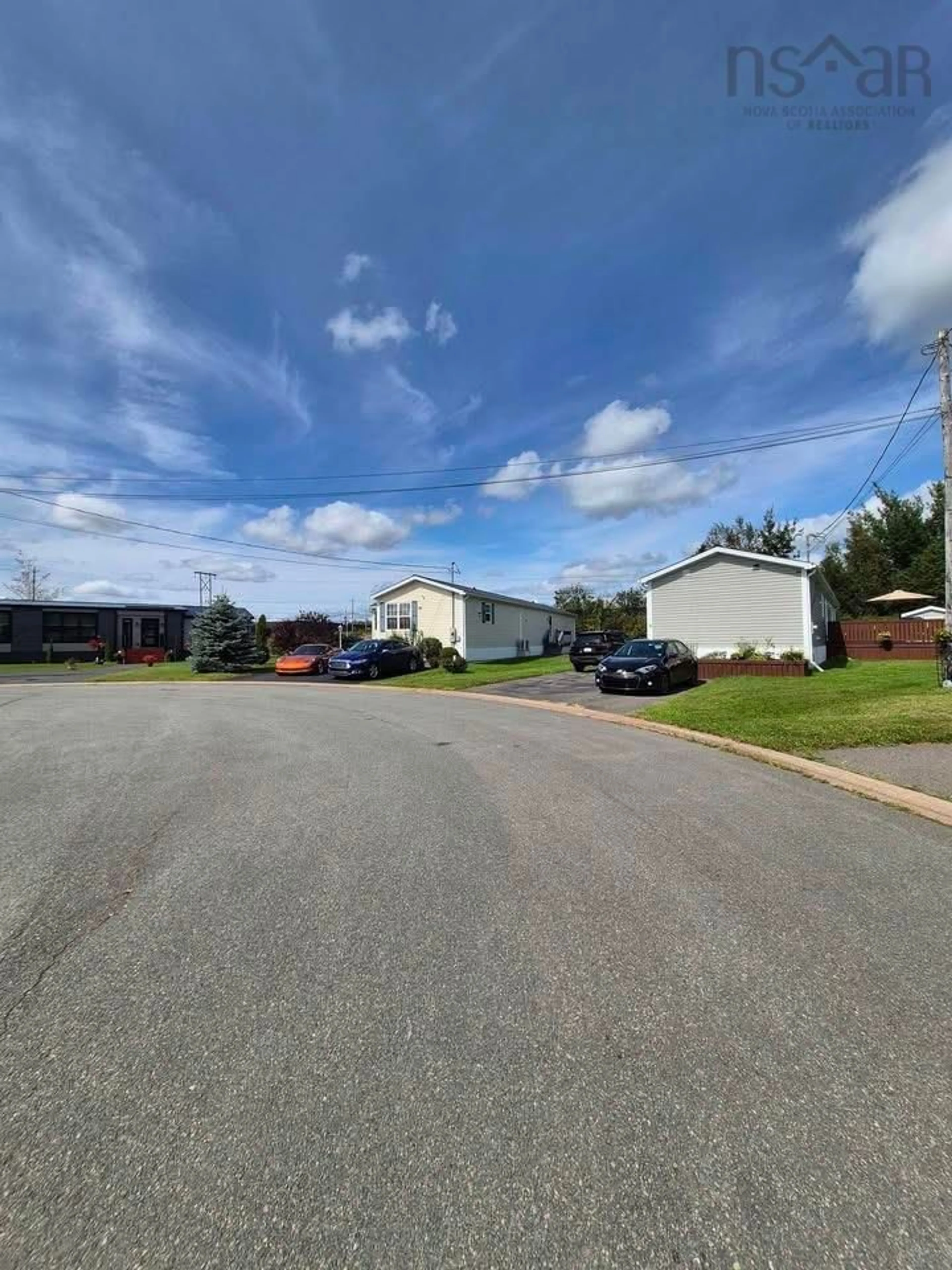 A pic from outside/outdoor area/front of a property/back of a property/a pic from drone, street for 5 Cambridge Crt, Amherst Nova Scotia B4H 0B7