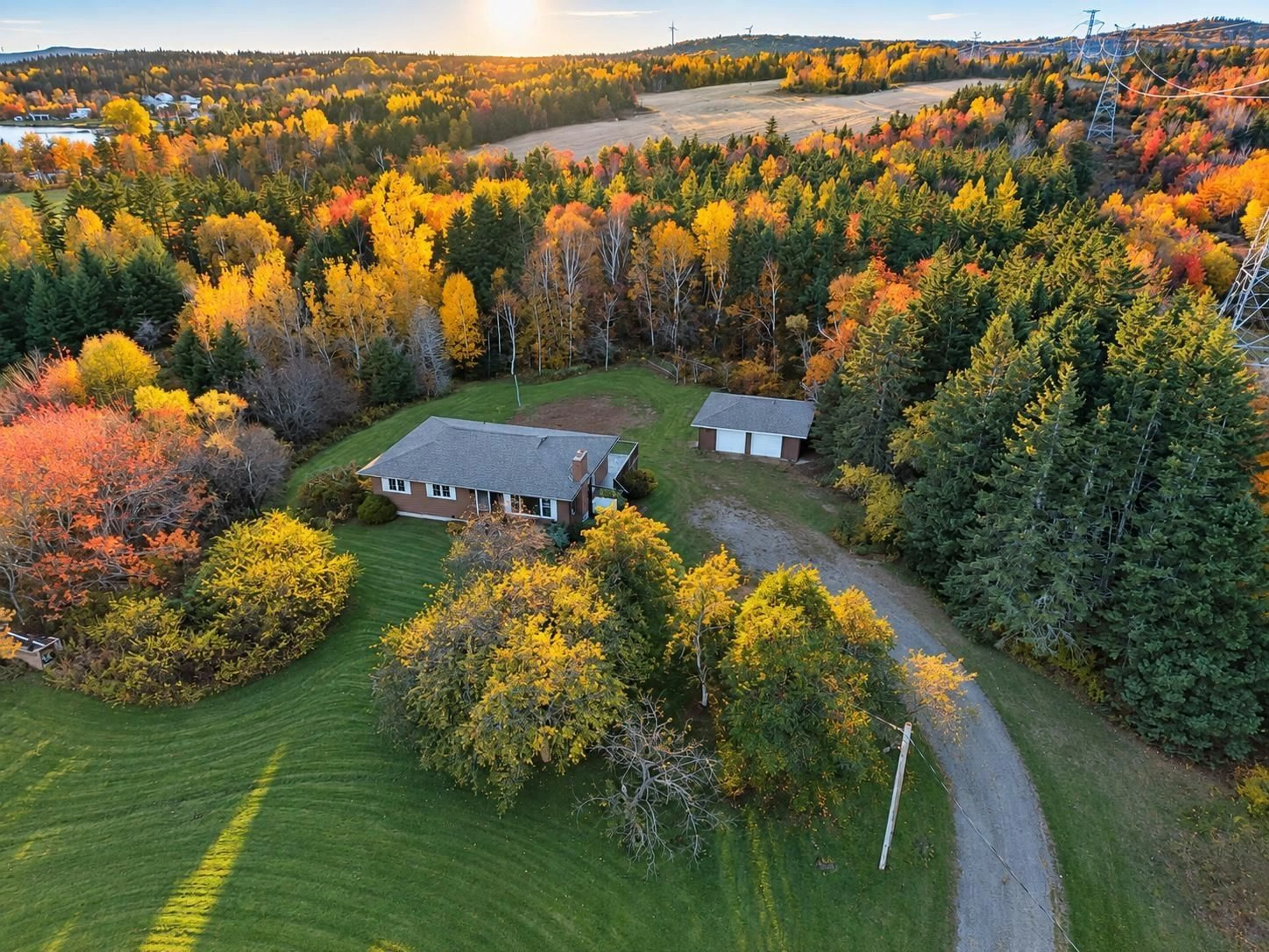 A pic from outside/outdoor area/front of a property/back of a property/a pic from drone, forest/trees view for 49 Point Aconi Rd, Point Aconi Nova Scotia B1Y 3B2