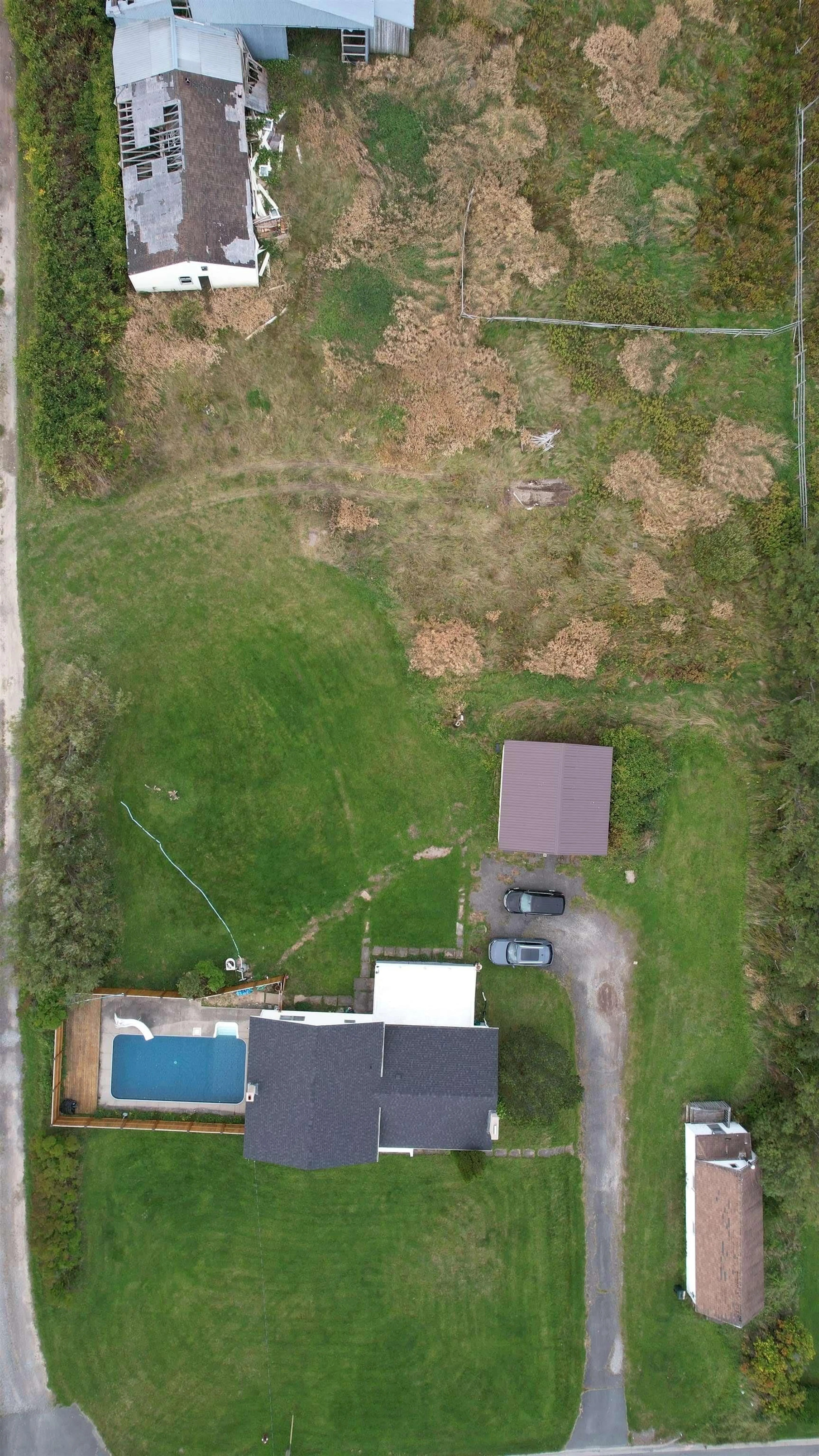 A pic from outside/outdoor area/front of a property/back of a property/a pic from drone, street for 89 Wallace Rd, Glace Bay Nova Scotia B1A 4N6