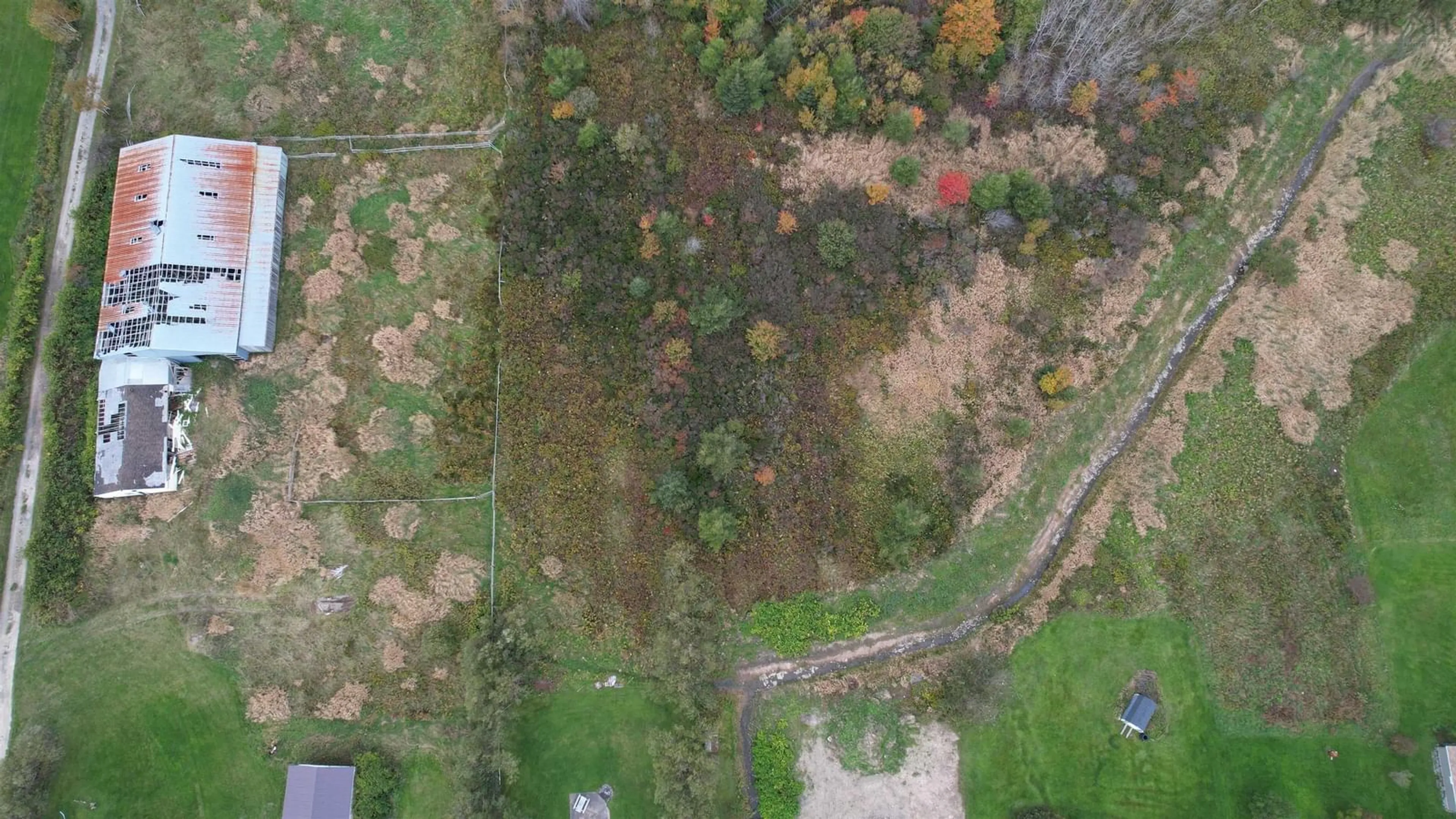 A pic from outside/outdoor area/front of a property/back of a property/a pic from drone, forest/trees view for 89 Wallace Rd, Glace Bay Nova Scotia B1A 4N6