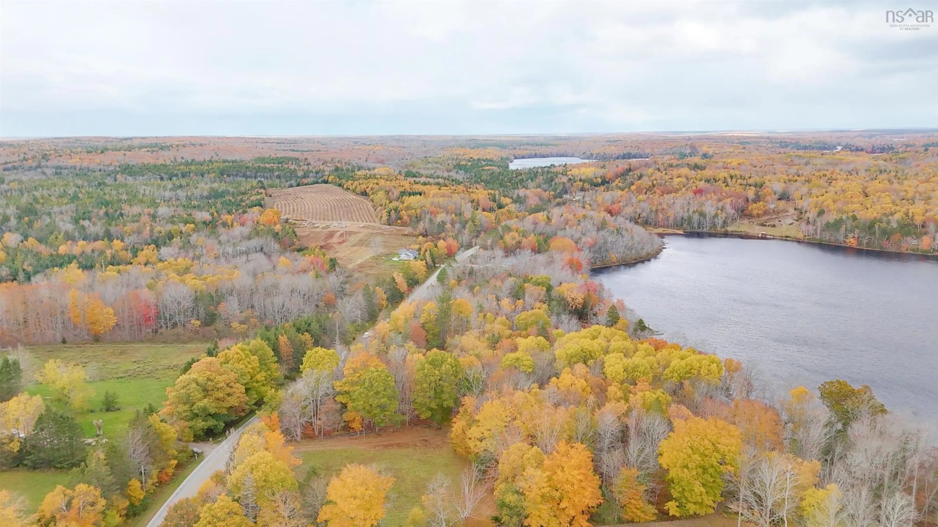 A pic from outside/outdoor area/front of a property/back of a property/a pic from drone, water/lake/river/ocean view for 4848 Highway 340, Carleton Nova Scotia B5A 5P9