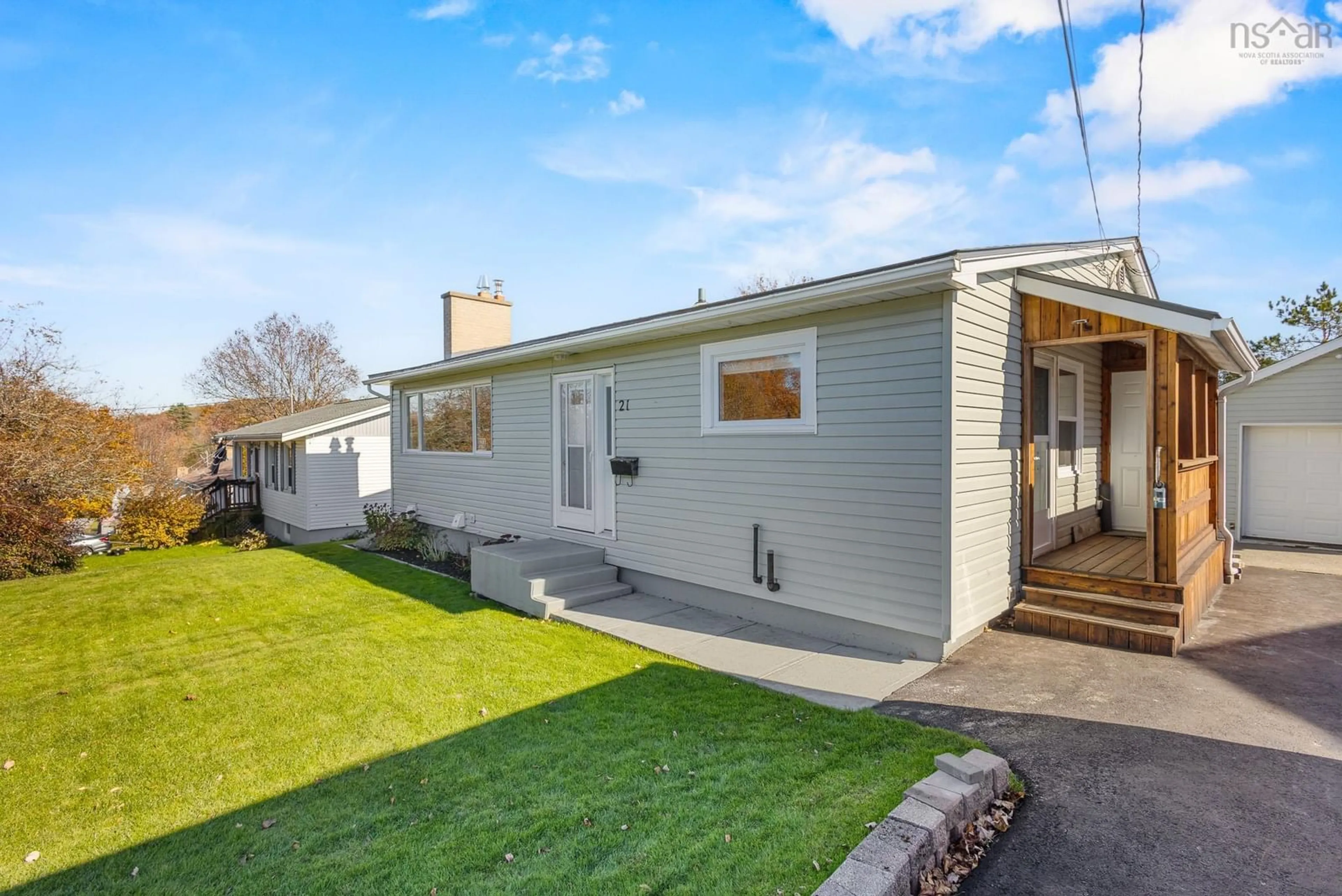 Home with vinyl exterior material, street for 21 Laurie Dr, Lower Sackville Nova Scotia B4E 1G1