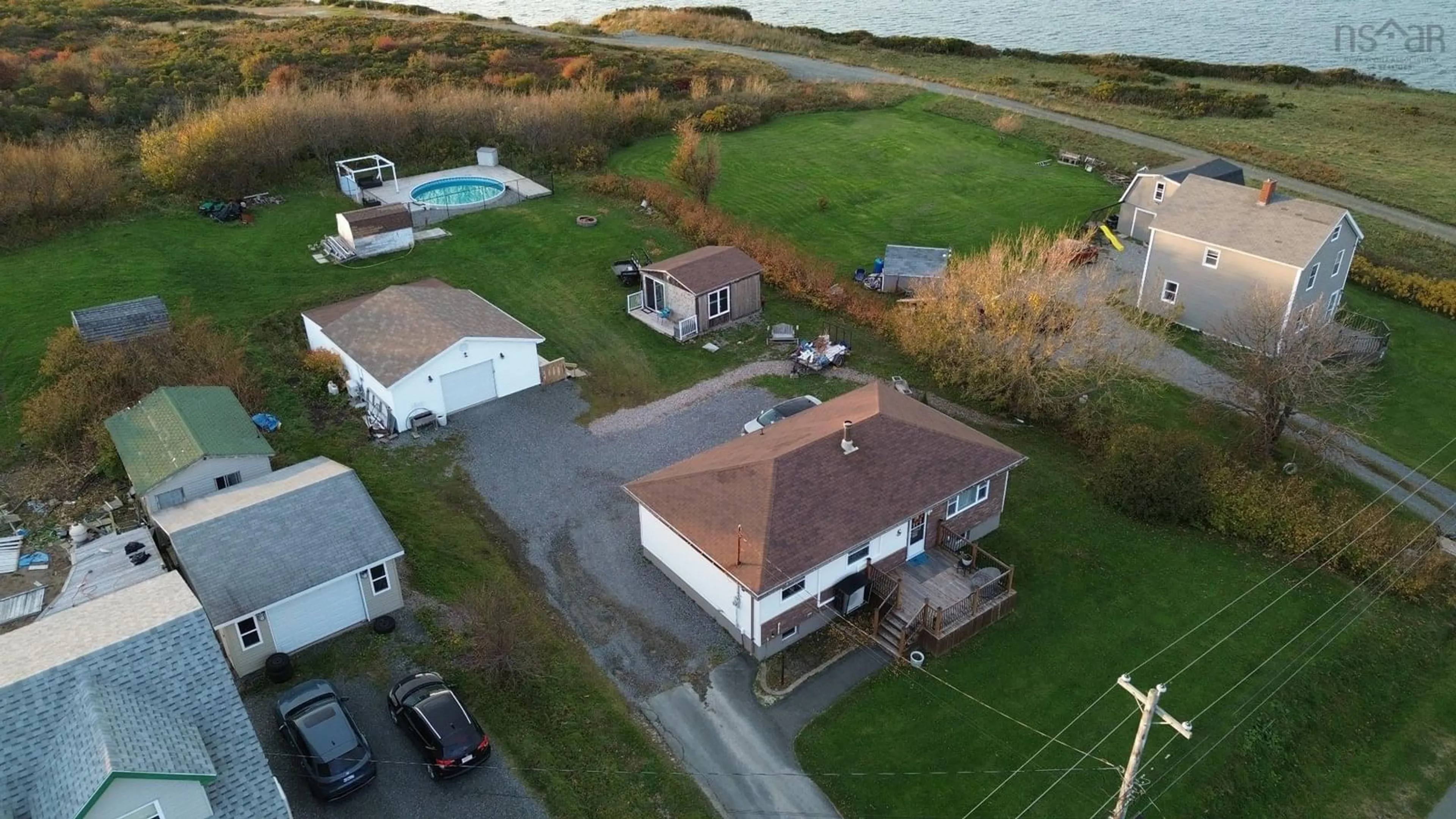 A pic from outside/outdoor area/front of a property/back of a property/a pic from drone, unknown for 45 Cottage St, Dominion Nova Scotia B1G 1C2