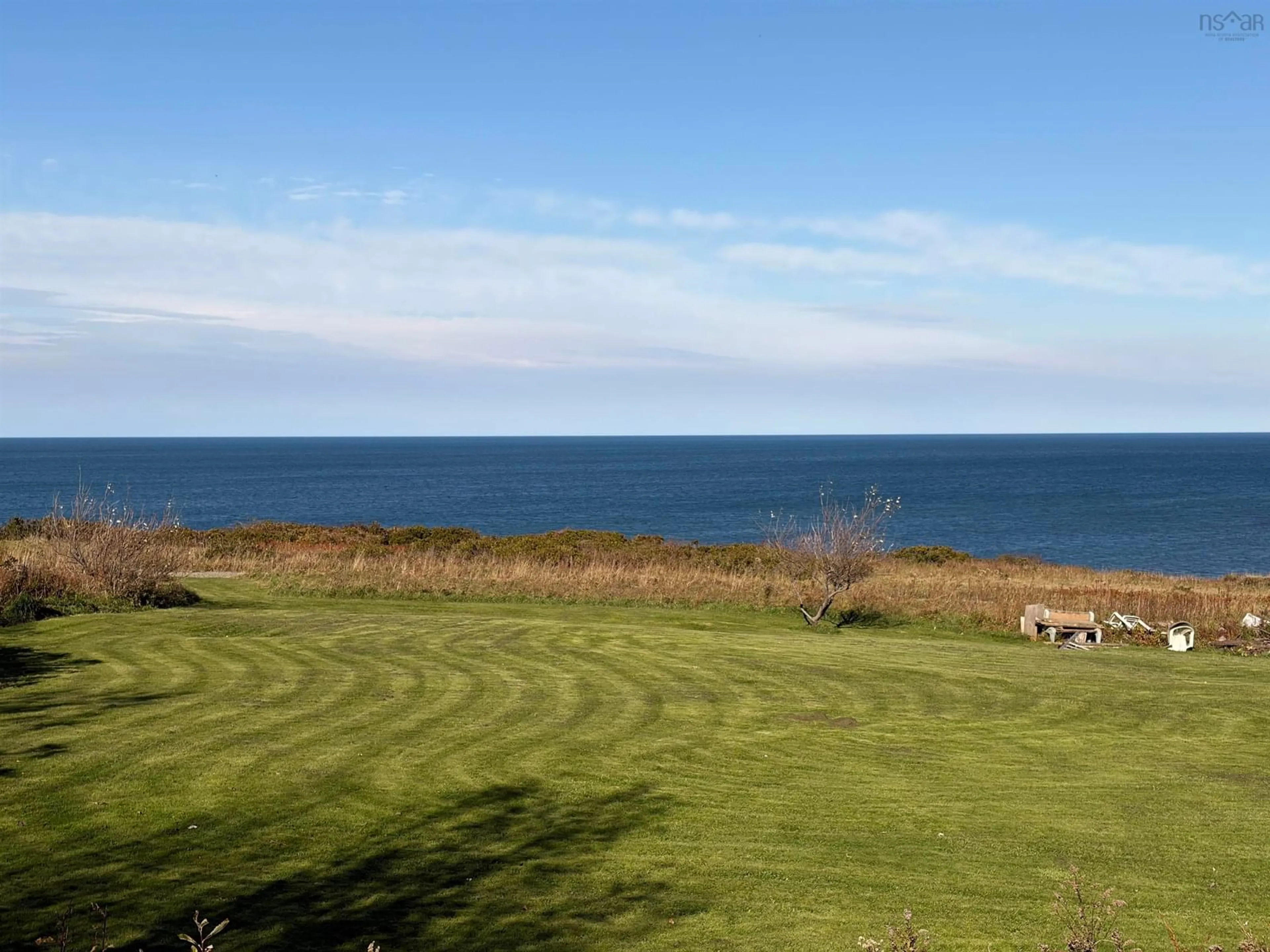 A pic from outside/outdoor area/front of a property/back of a property/a pic from drone, water/lake/river/ocean view for 45 Cottage St, Dominion Nova Scotia B1G 1C2