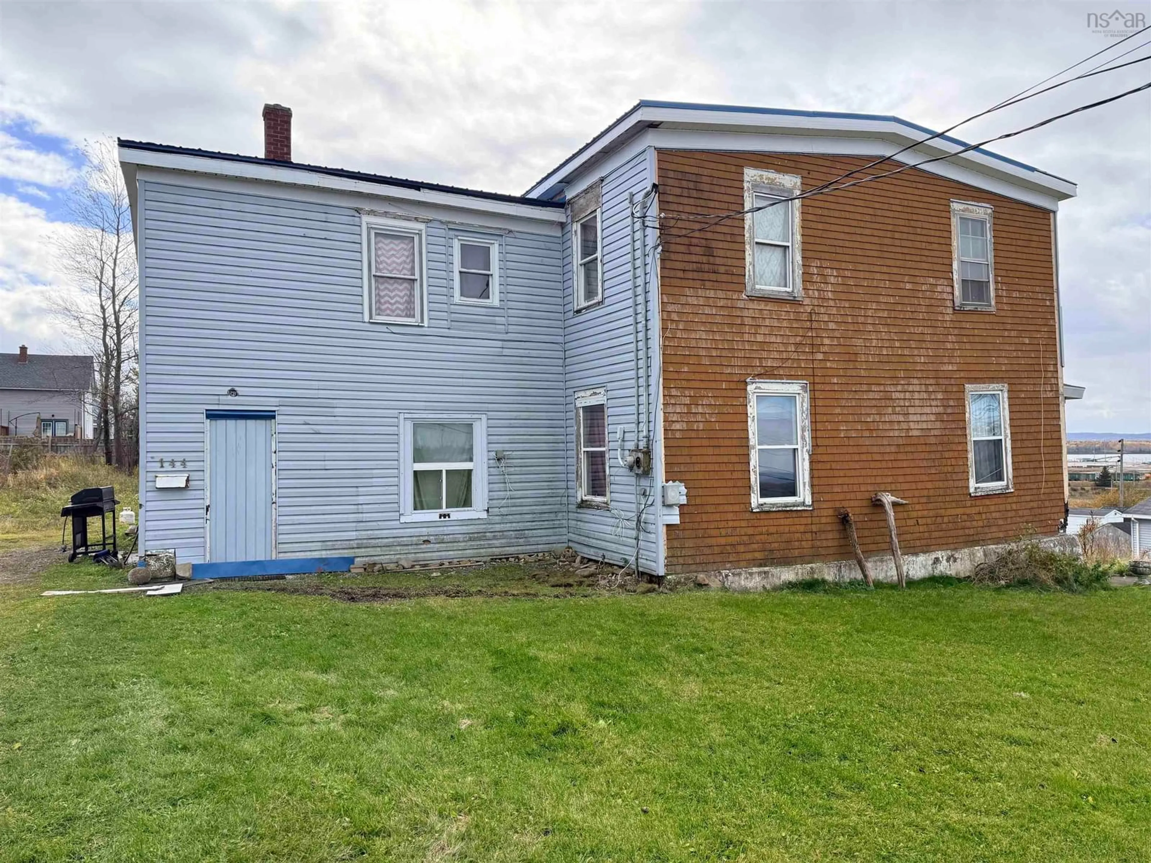 A pic from outside/outdoor area/front of a property/back of a property/a pic from drone, building for 144 Dominion Street, Sydney Nova Scotia B1N 2V3