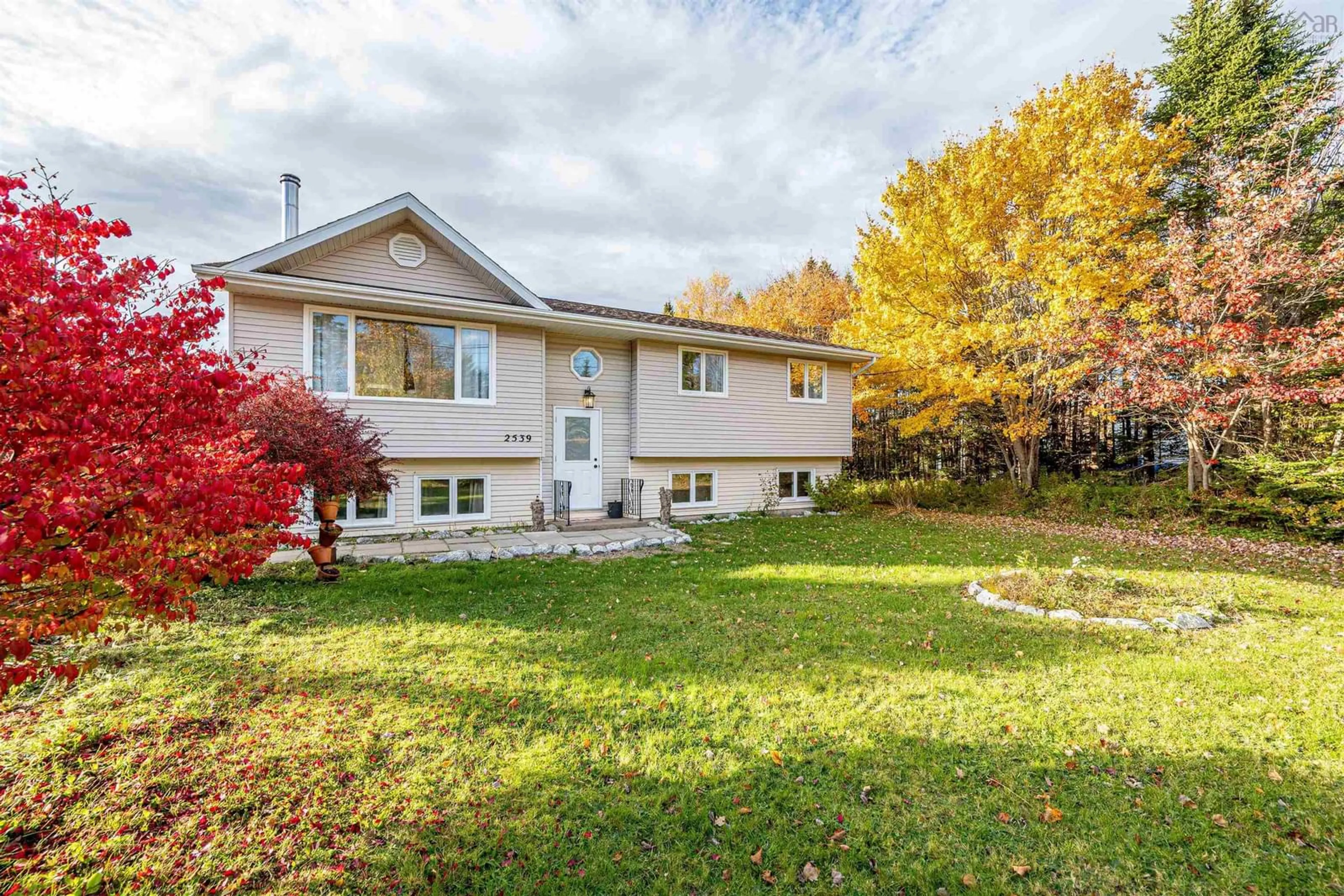 Home with vinyl exterior material, street for 2539 Prospect Rd, Hatchet Lake Nova Scotia B3T 1V3