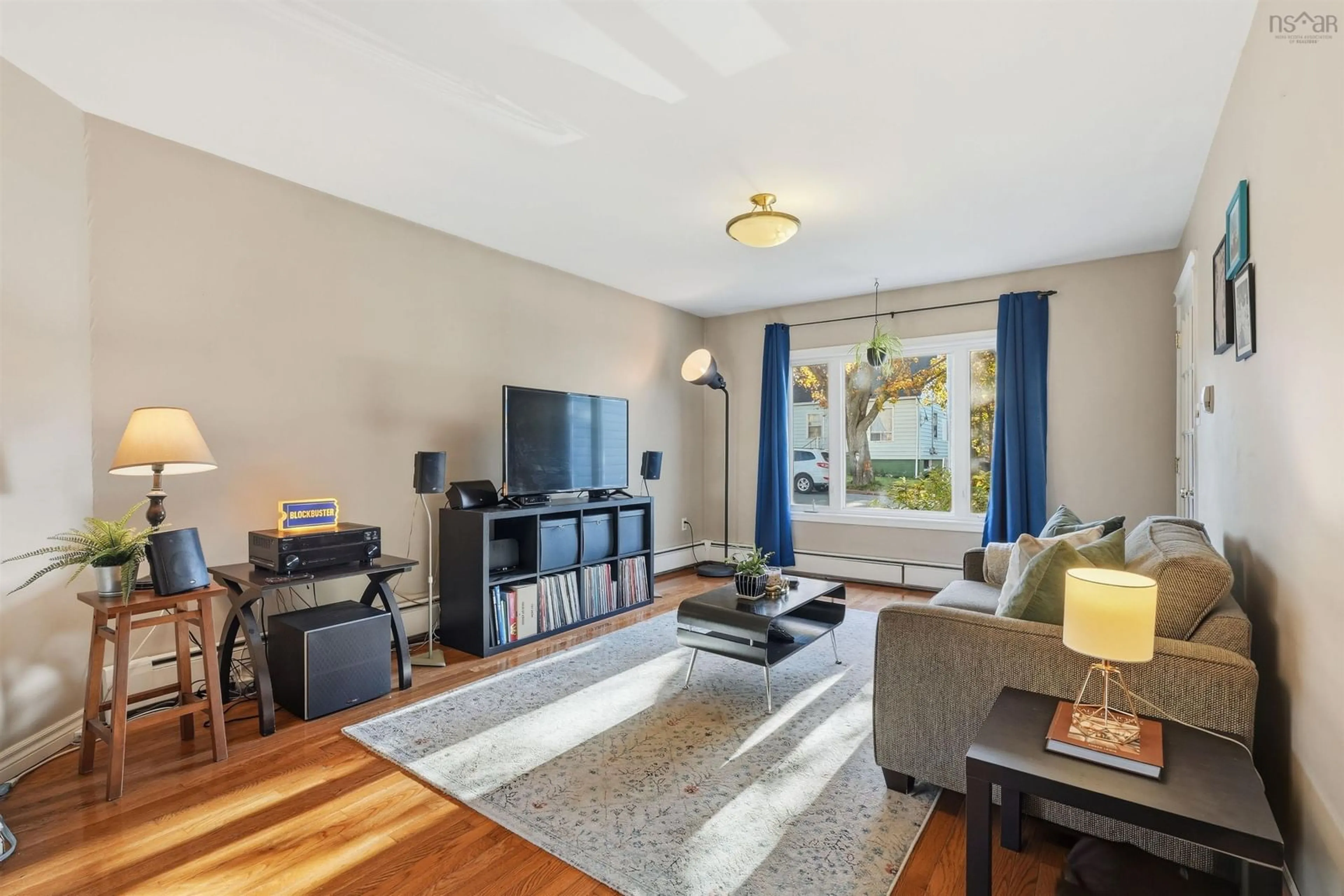 Living room with furniture, wood/laminate floor for 27 Symonds St, Dartmouth Nova Scotia B3A 3L4