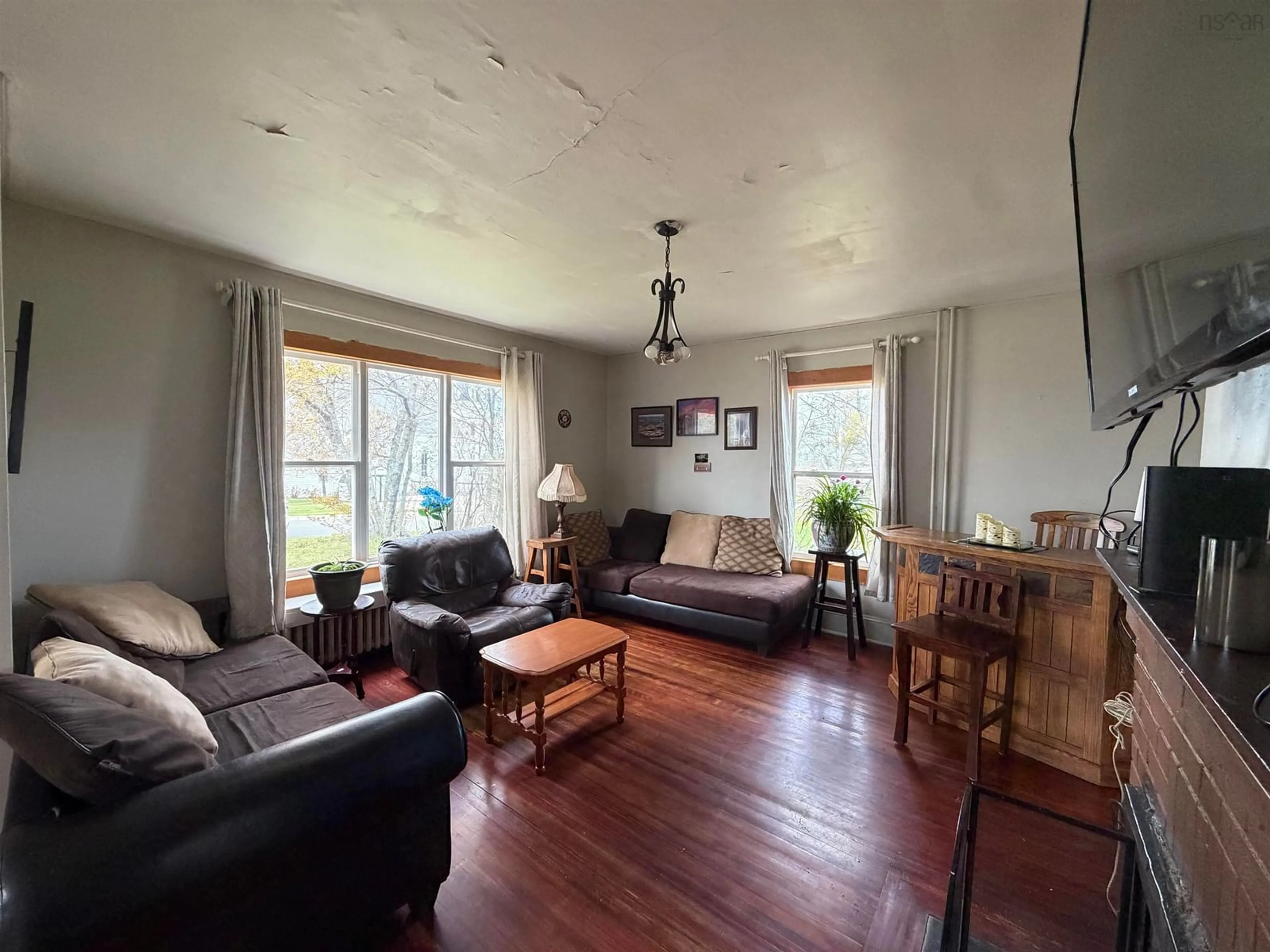 Living room with furniture, unknown for 568 George St, New Waterford Nova Scotia B1H 4E3