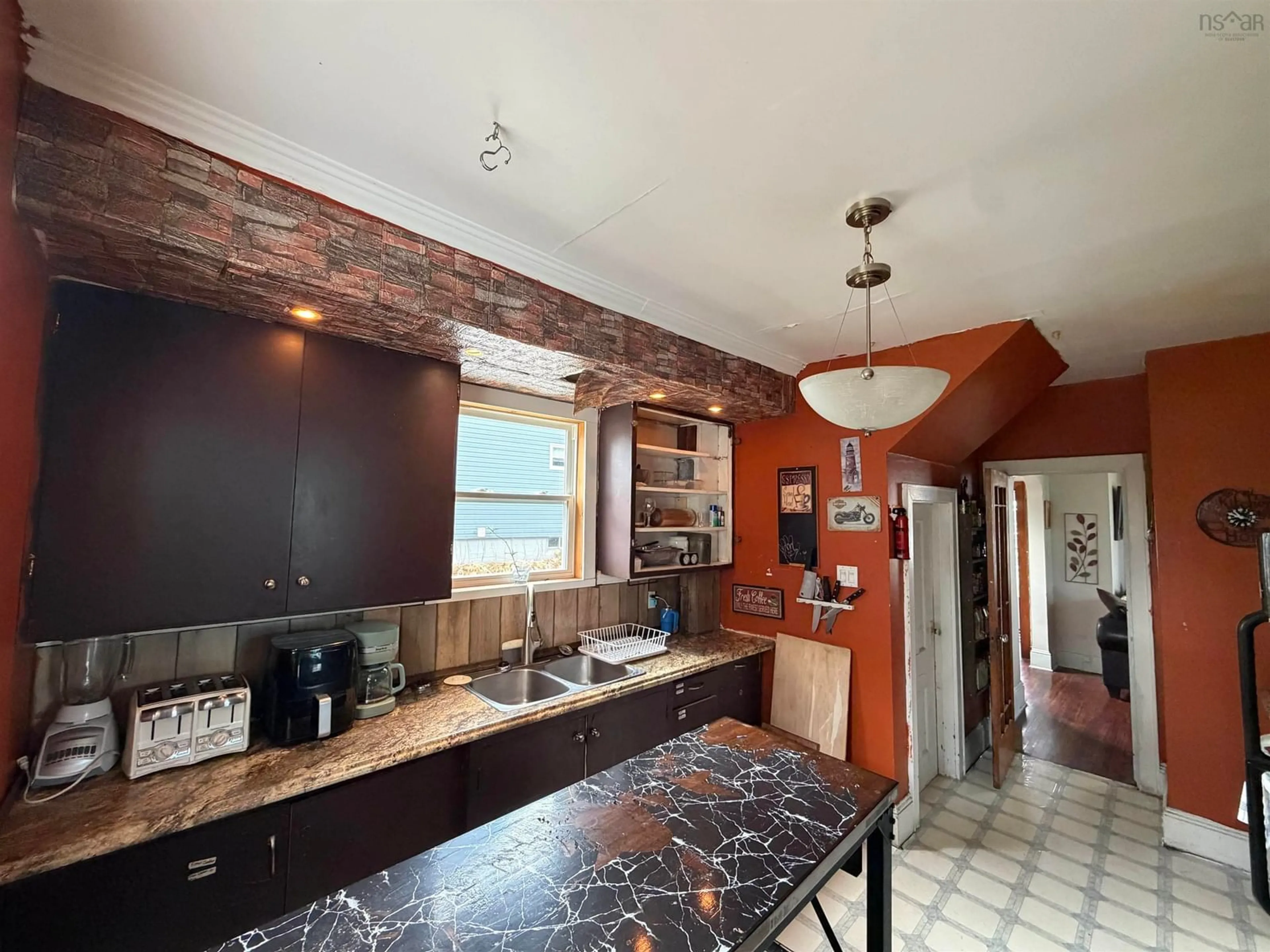 Open concept kitchen, ceramic/tile floor for 568 George St, New Waterford Nova Scotia B1H 4E3