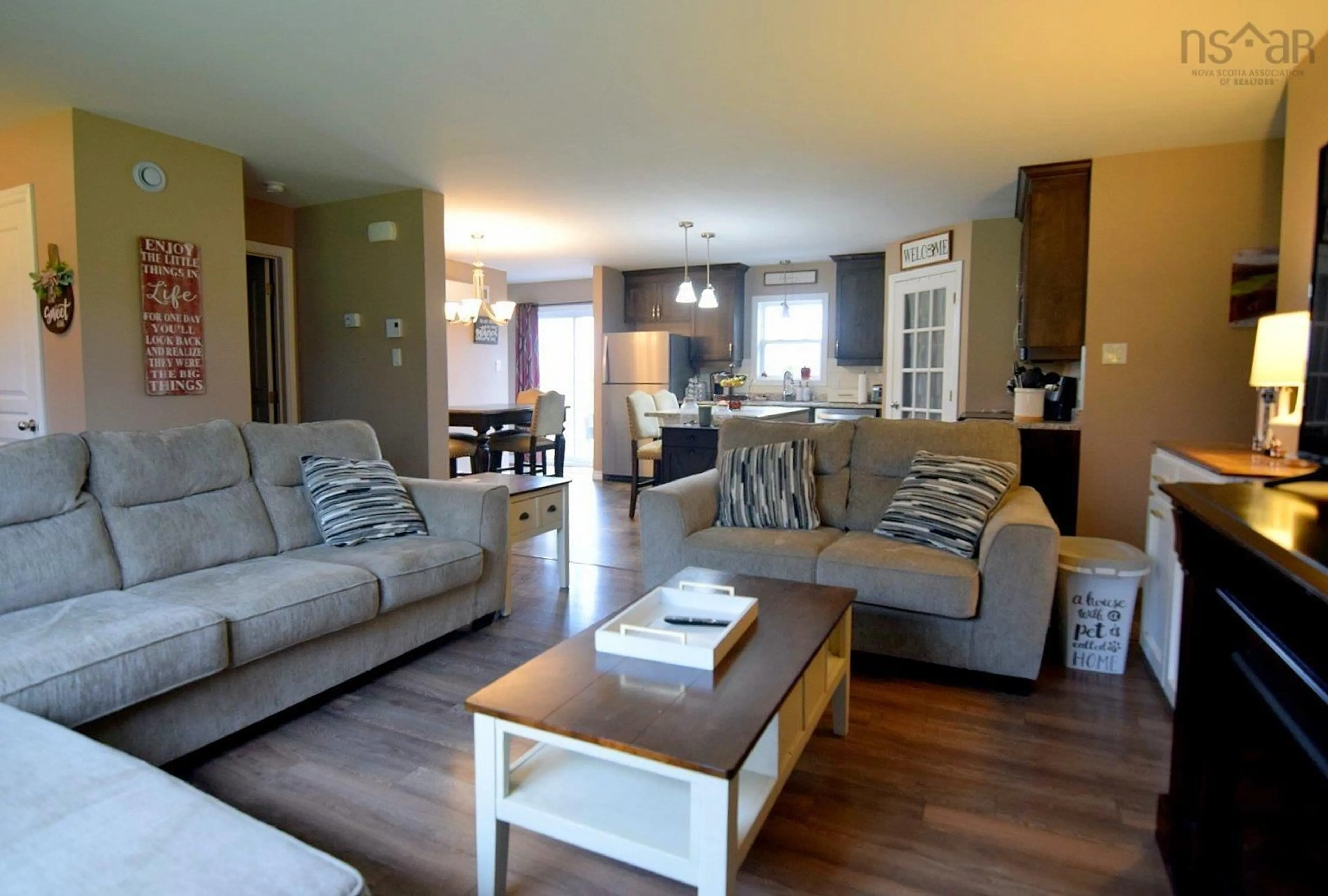 Living room with furniture, wood/laminate floor for 30 Inverside Lane, Inverness Nova Scotia B0E 1N0