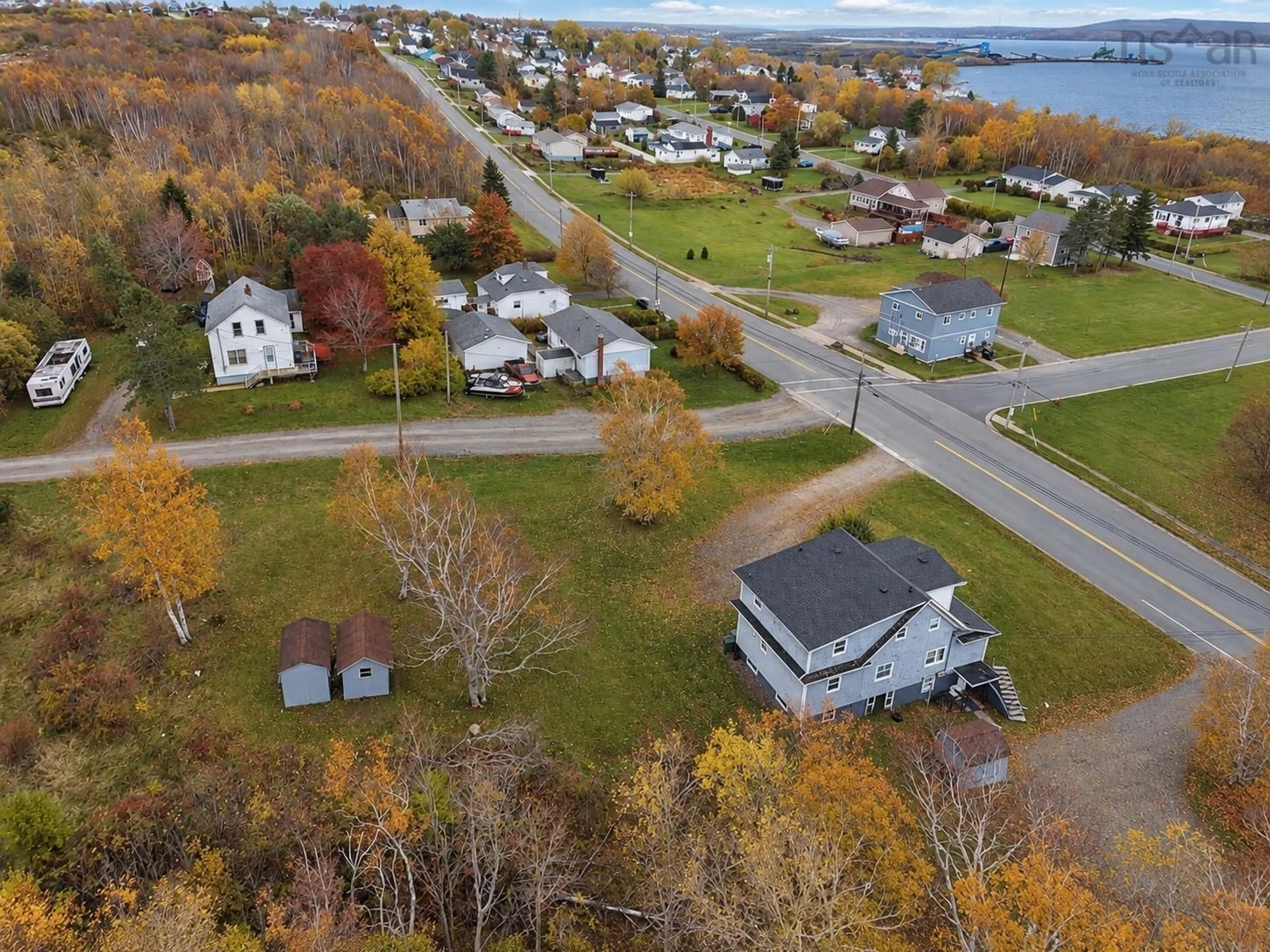 A pic from outside/outdoor area/front of a property/back of a property/a pic from drone, water/lake/river/ocean view for 1696 Victoria Rd, Whitney Pier Nova Scotia B1N 1N3